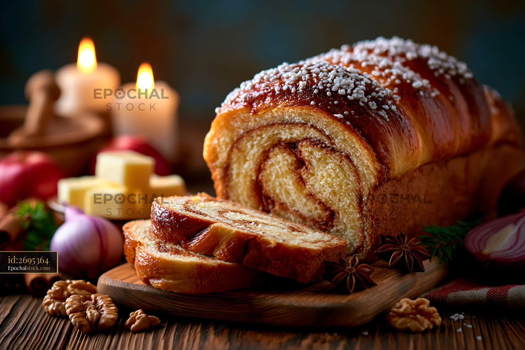 Watermarked full-resolution preview of Freshly baked cinnamon roll bread on a wooden board