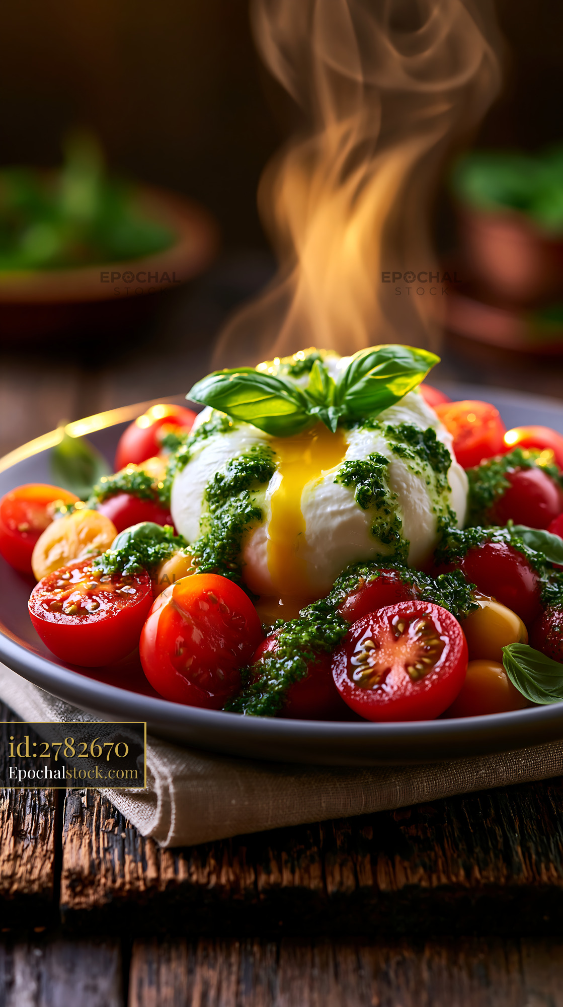 Watermarked full-resolution preview of Burrata cheese with cherry tomatoes and basil on a wooden table