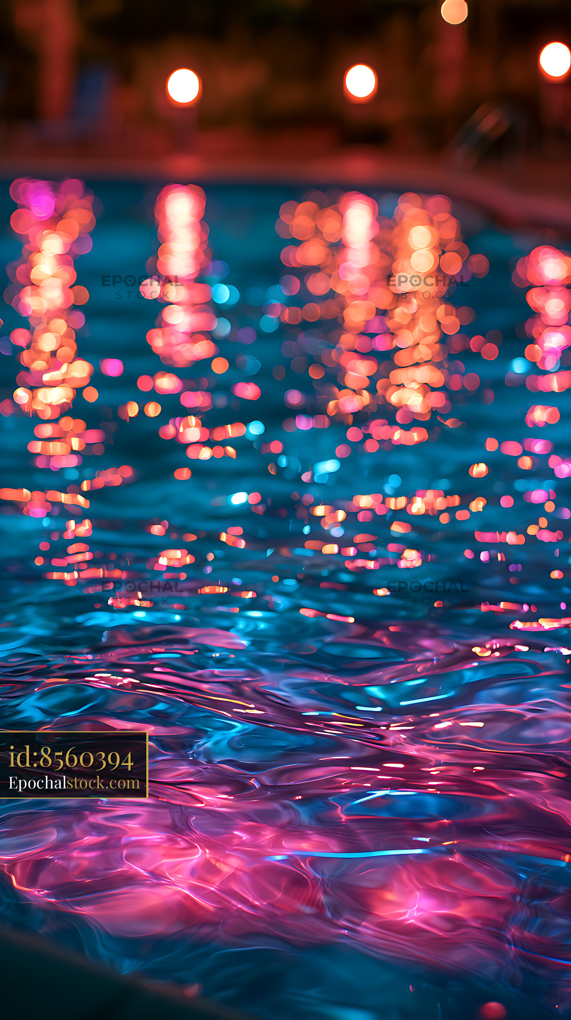 Watermarked full-resolution preview of Colorful bokeh lights reflected on rippling water
