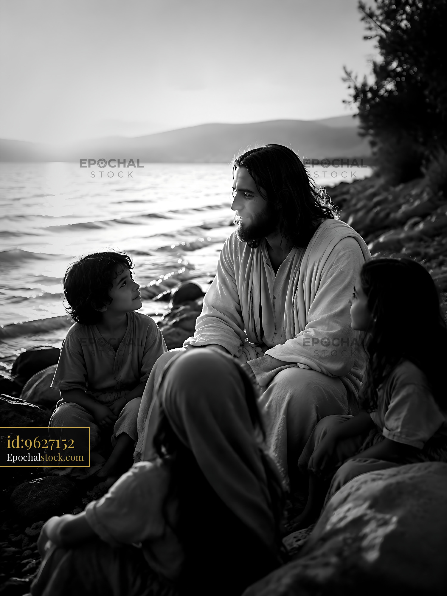 Watermarked full-resolution preview of Man seated with children by a lake at sunset