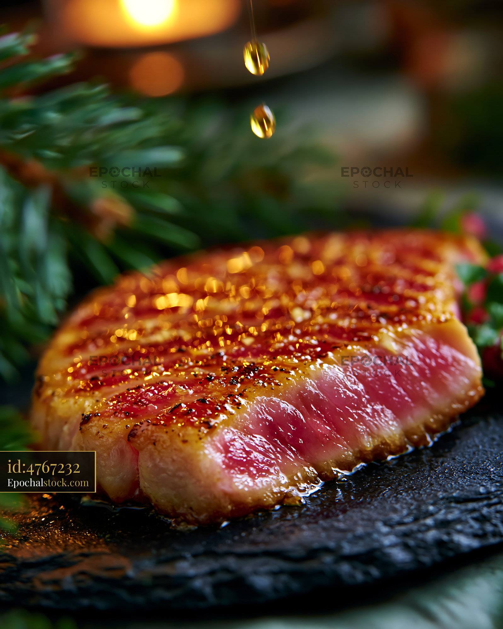 Watermarked full-resolution preview of Juicy grilled steak slice on a dark plate with herbs