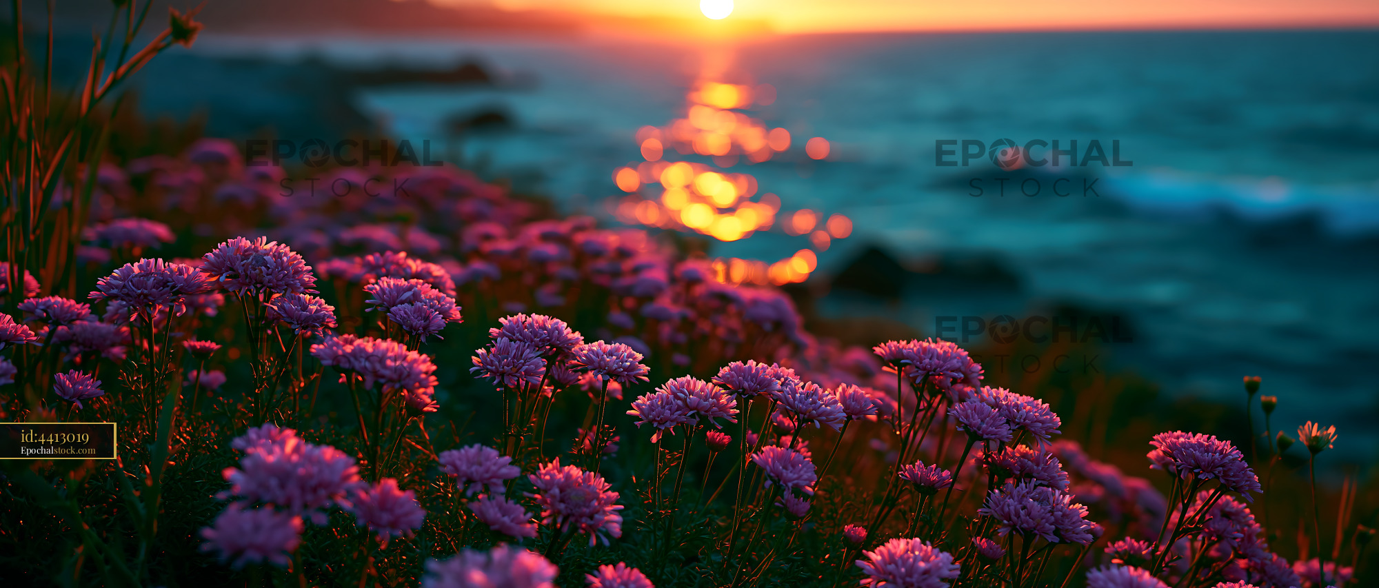 Watermarked full-resolution preview of Flowers bloom near ocean at sunset