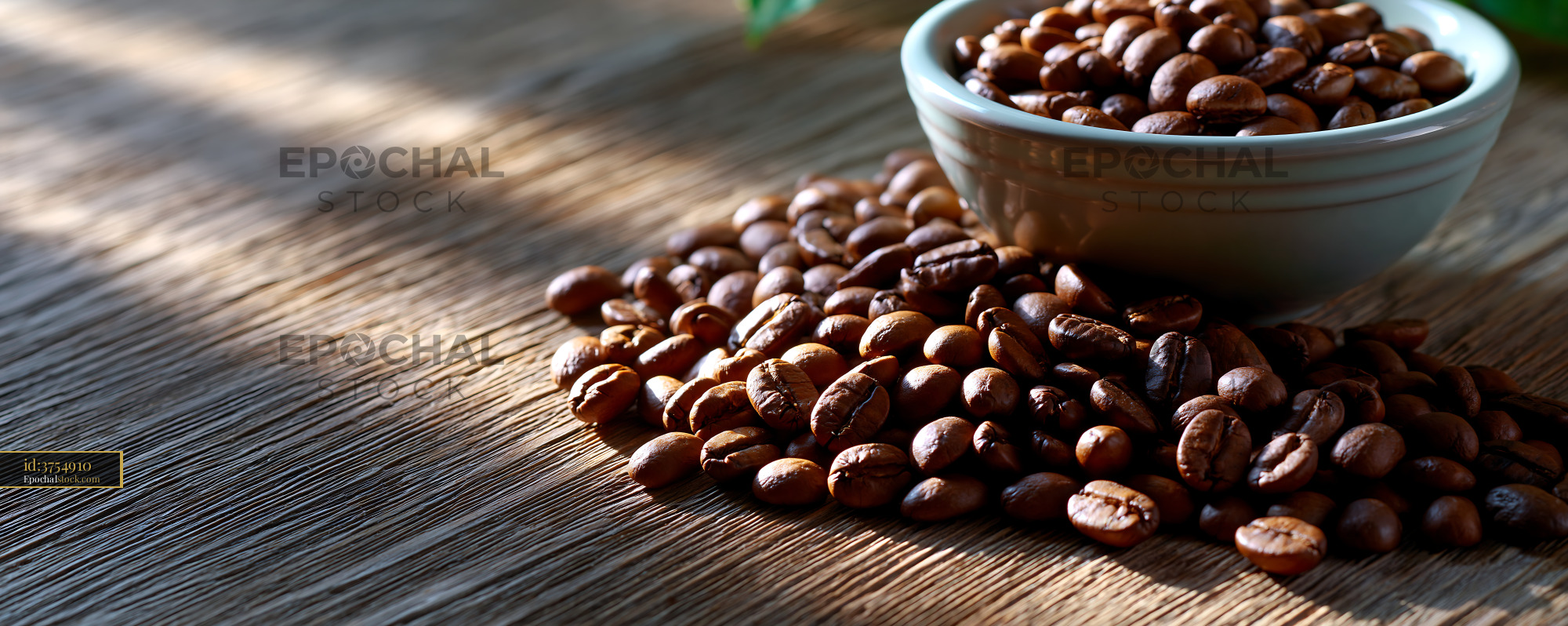 Watermarked full-resolution preview of Roasted Coffee Beans in Bowl with Scattered Beans