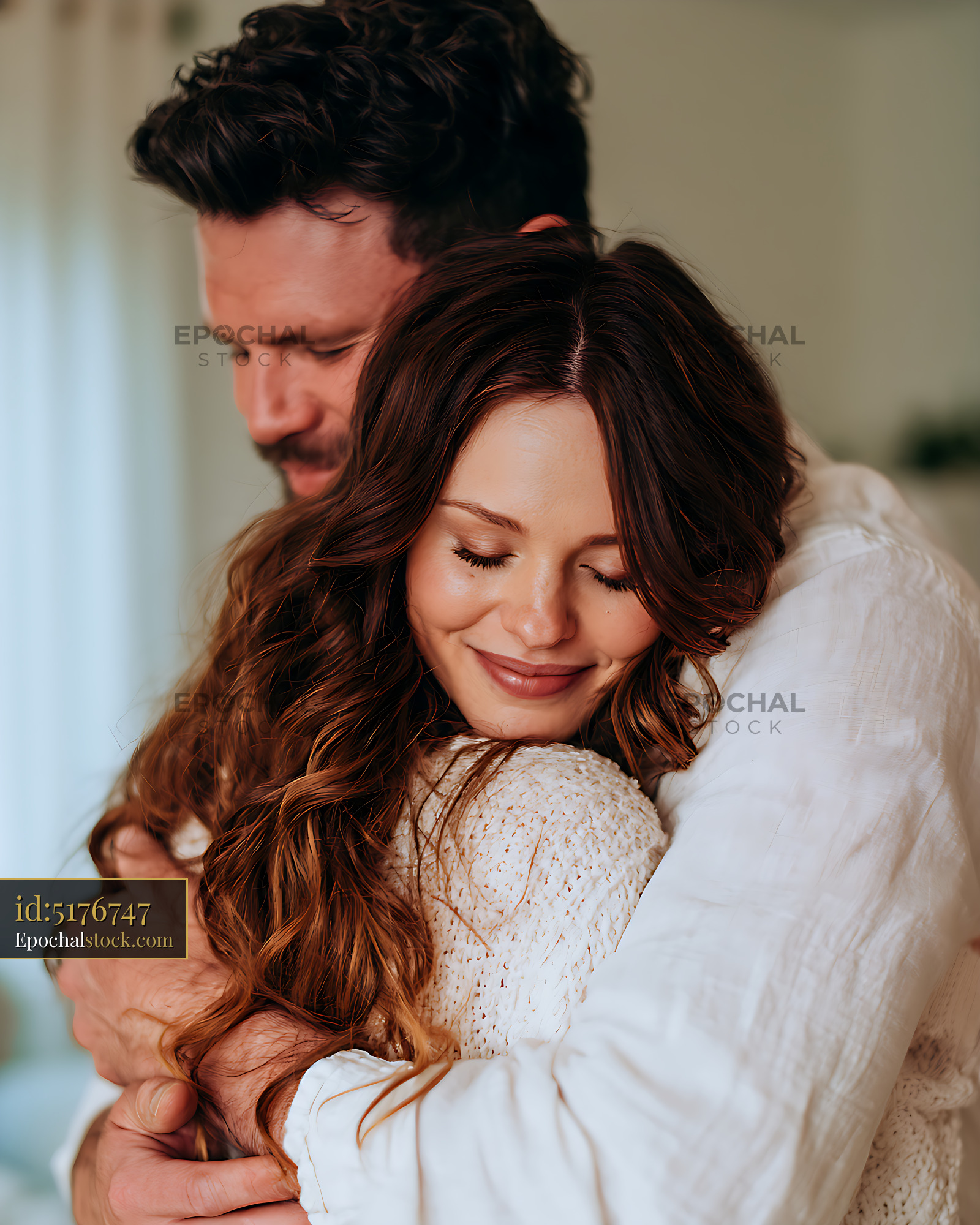 Watermarked full-resolution preview of Tender couple sharing a warm embrace