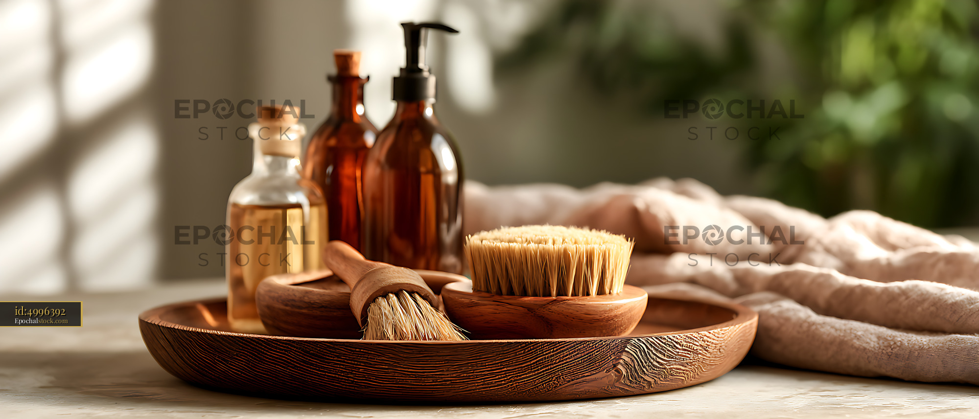 Watermarked full-resolution preview of Spa accessories with wooden brushes and amber bottles