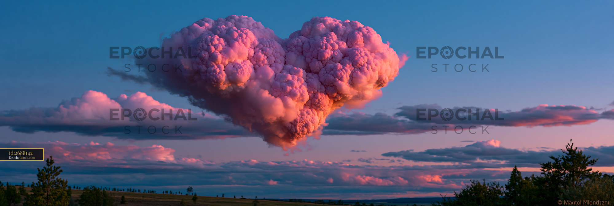 Watermarked full-resolution preview of Towering pink storm cloud at sunset