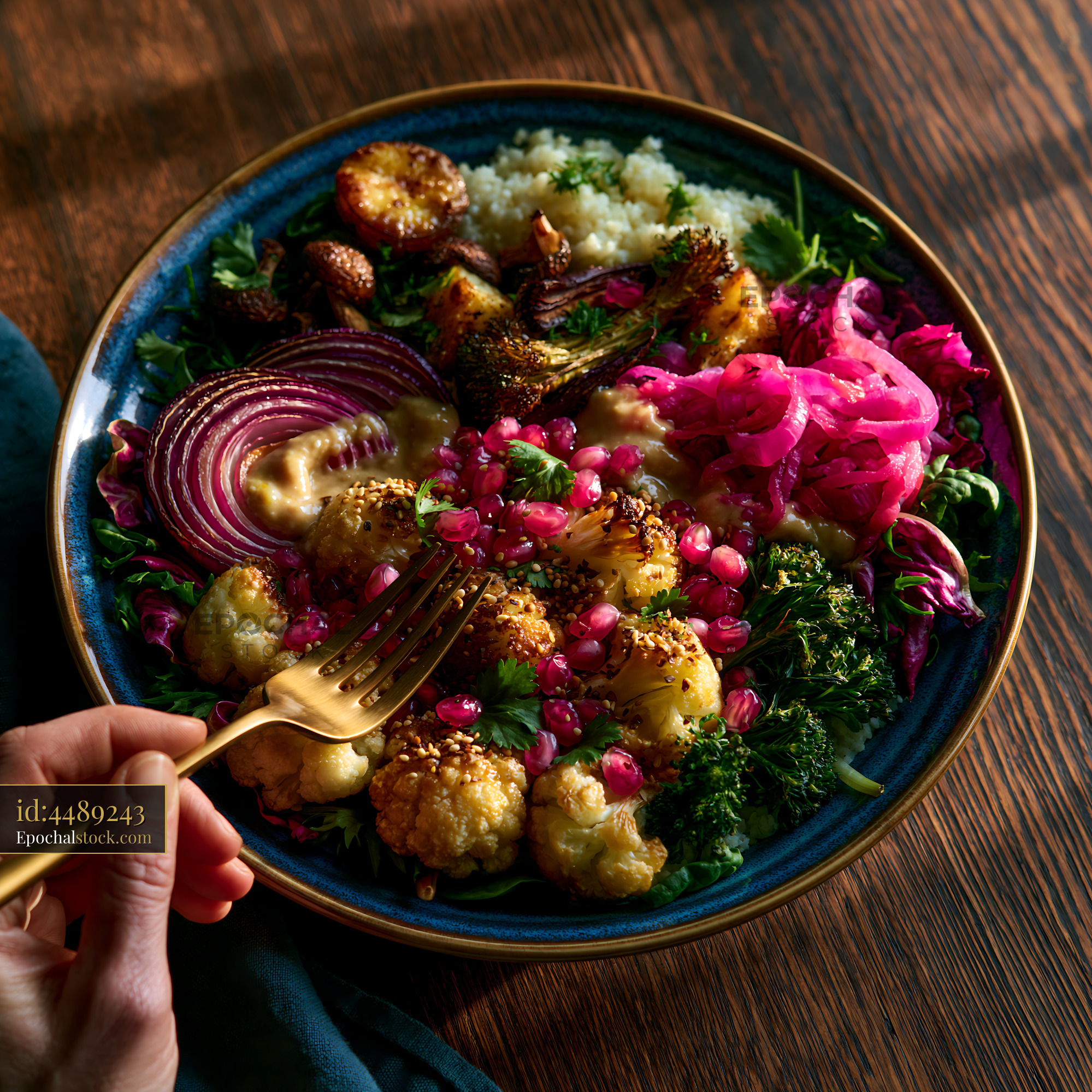 Watermarked full-resolution preview of Plated meal with roasted vegetables and colorful garnishes