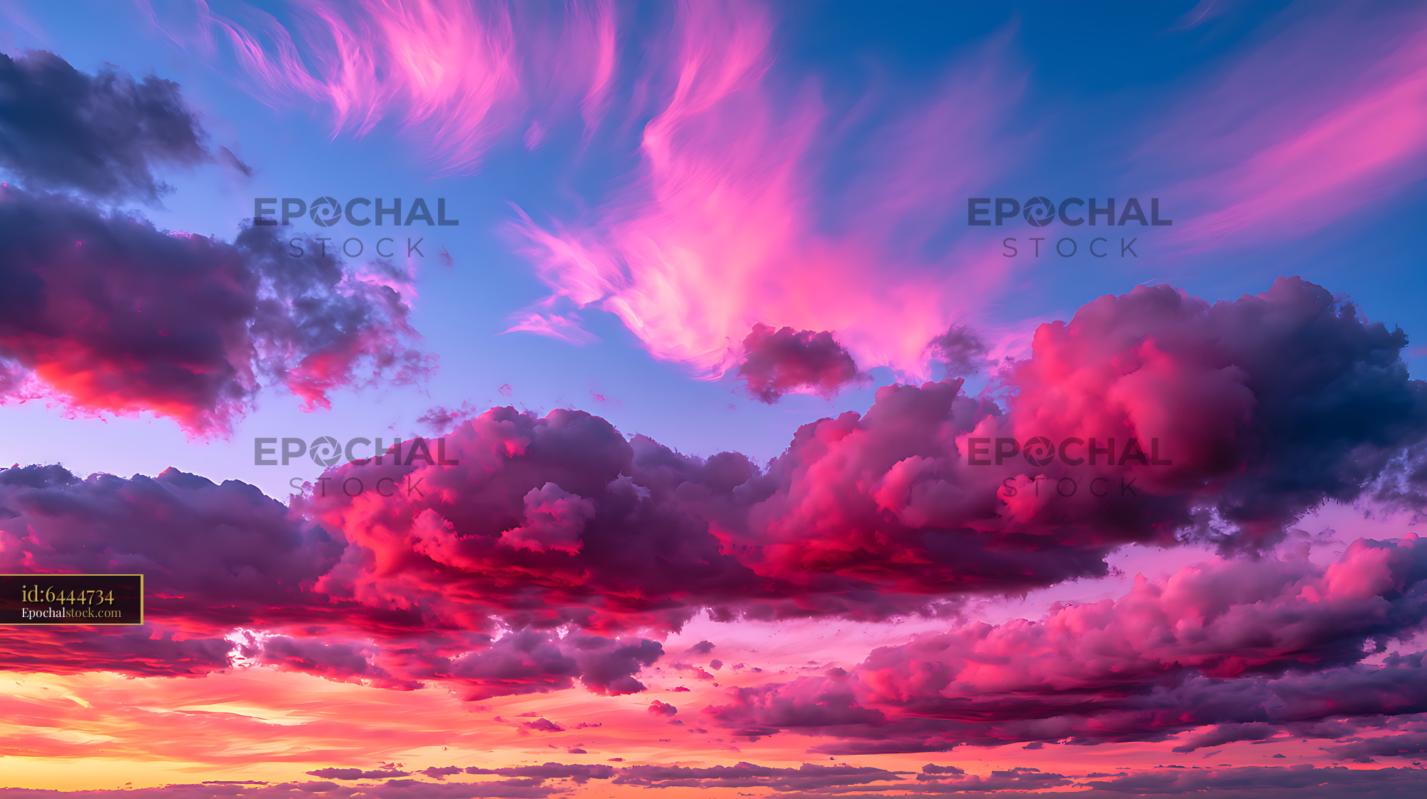 Watermarked full-resolution preview of Colorful sunset cloudscape in pink and purple