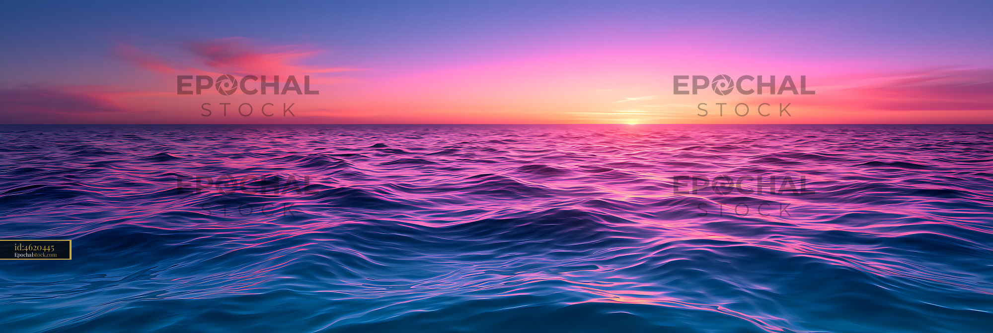 Watermarked full-resolution preview of Vibrant sunset over rippling ocean water