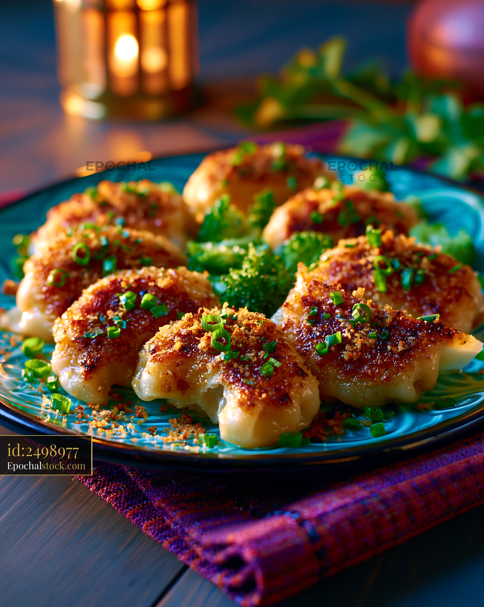 Watermarked full-resolution preview of Fried dumplings served on a plate with vegetables