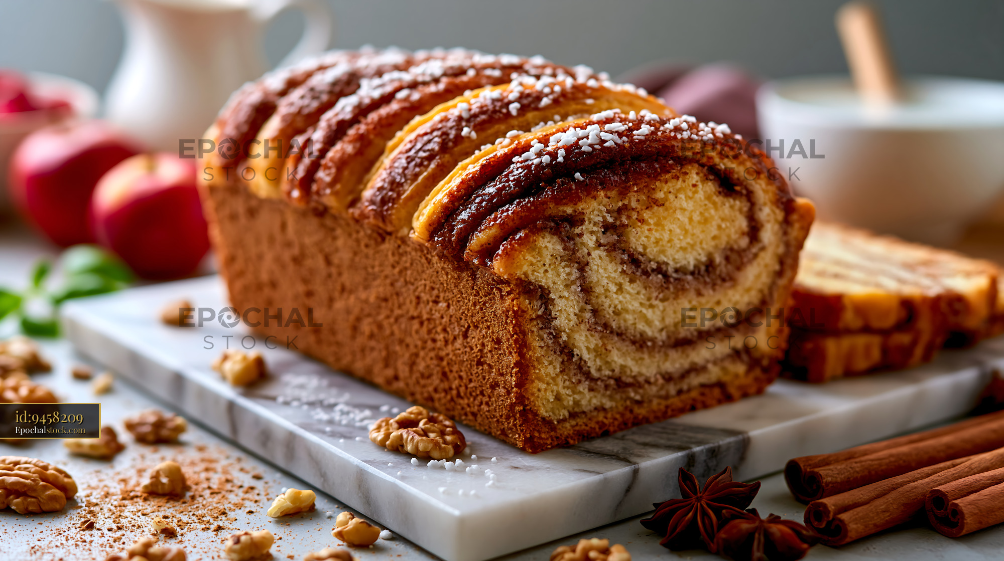 Watermarked full-resolution preview of Cinnamon swirl bread loaf on a marble cutting board