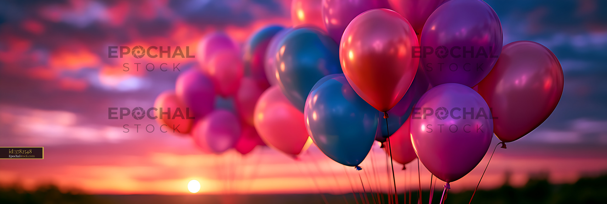 Watermarked full-resolution preview of Vibrant balloon cluster at sunset