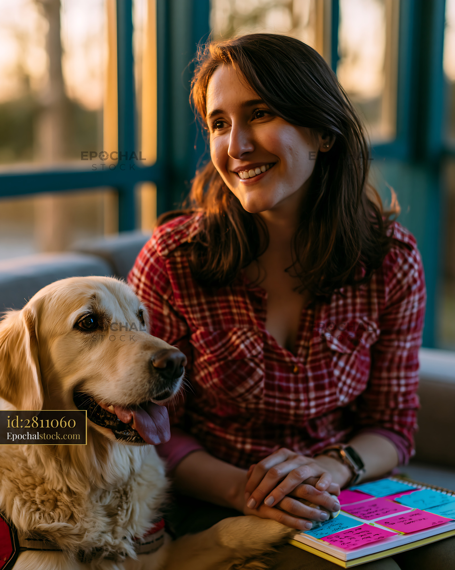 Watermarked full-resolution preview of Woman and dog sharing a warm indoor moment