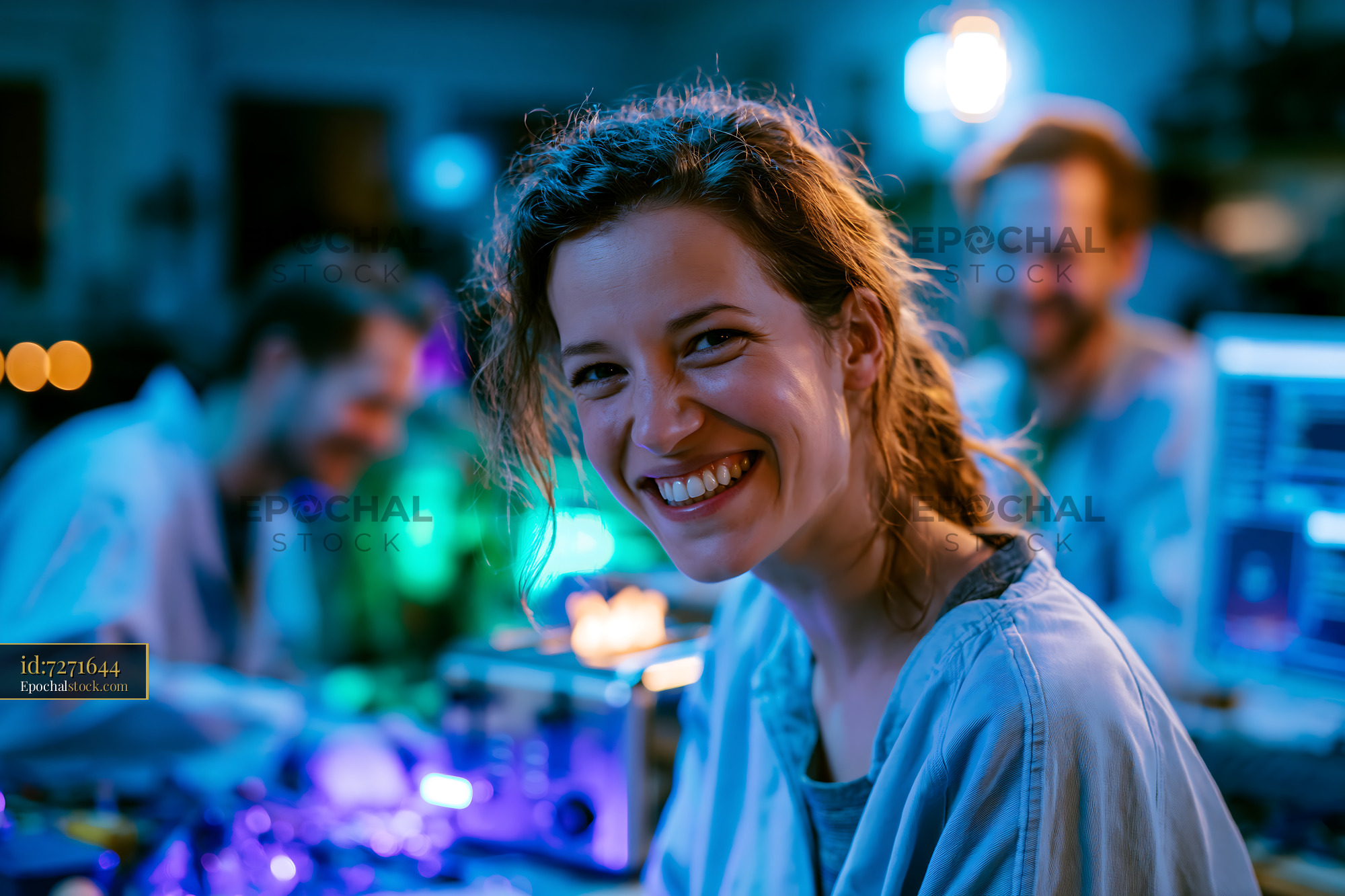 Sustainability Team at Workshop Repairing Electronics With Smiles — stock example for home hero and product mood