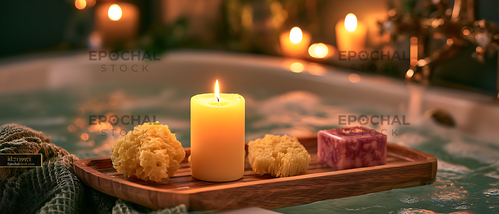 Watermarked full-resolution preview of Warm candlelight and spa soaps by a pool