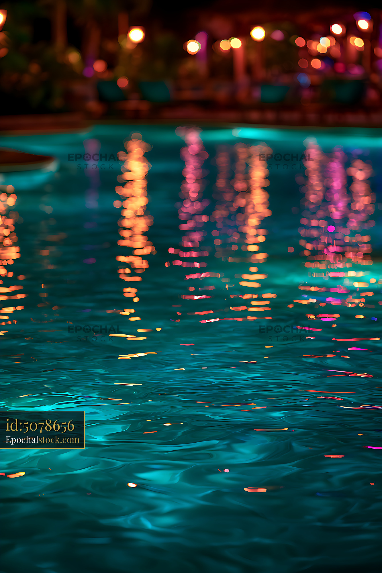 Watermarked full-resolution preview of Vibrant nighttime light reflections on rippling water