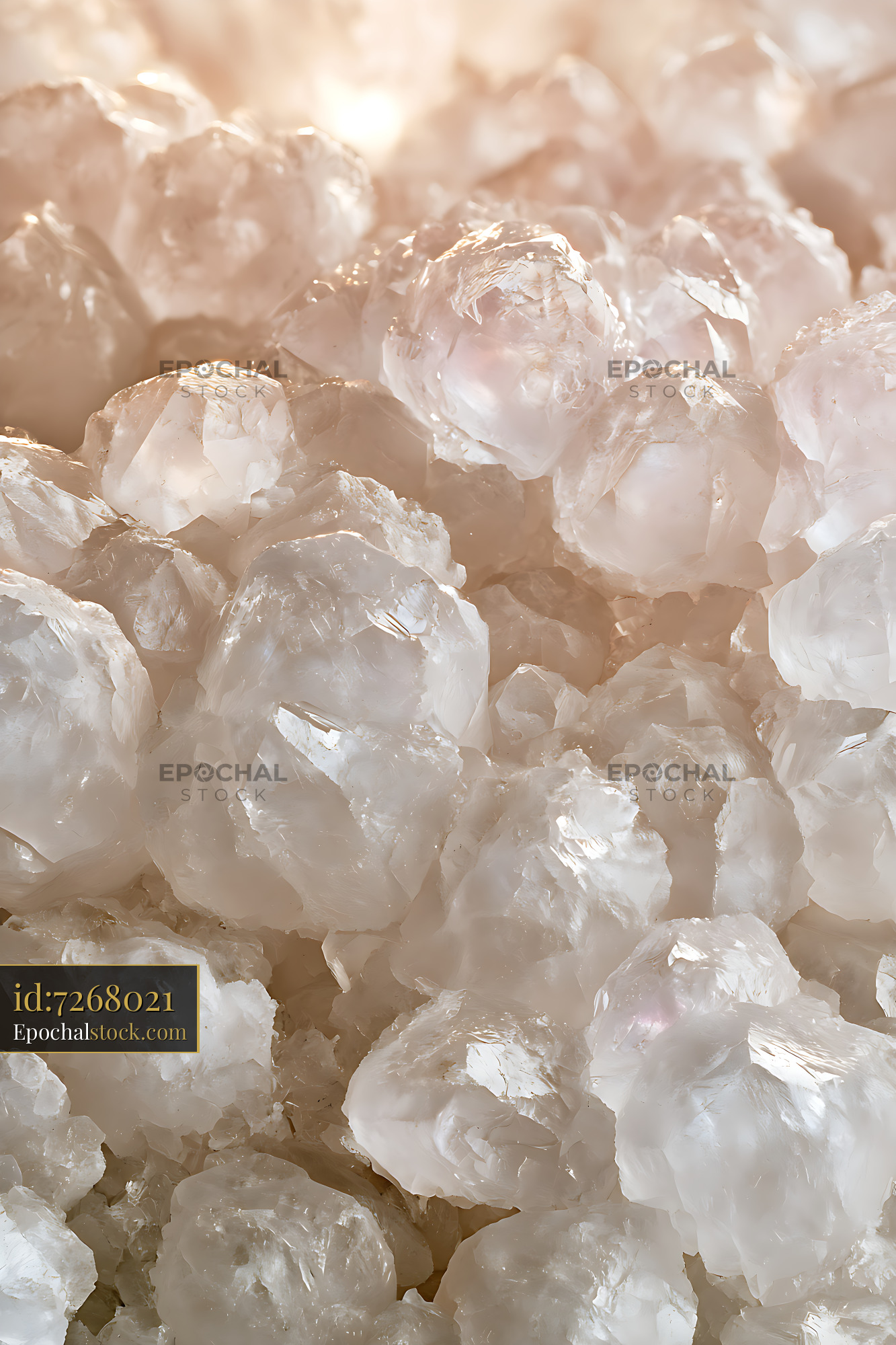 Watermarked full-resolution preview of Close-up of translucent ice illuminated by warm light