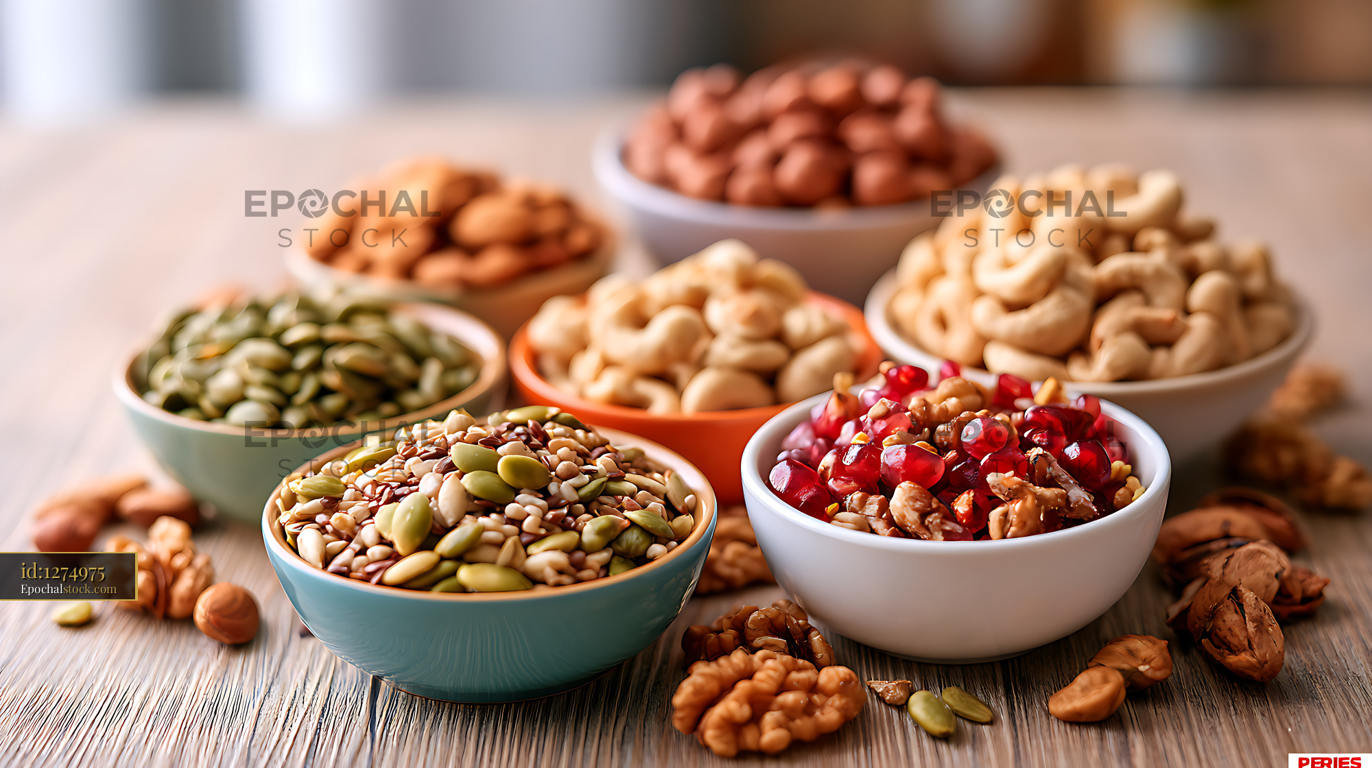 Watermarked full-resolution preview of Assorted nuts and seeds arranged in bowls