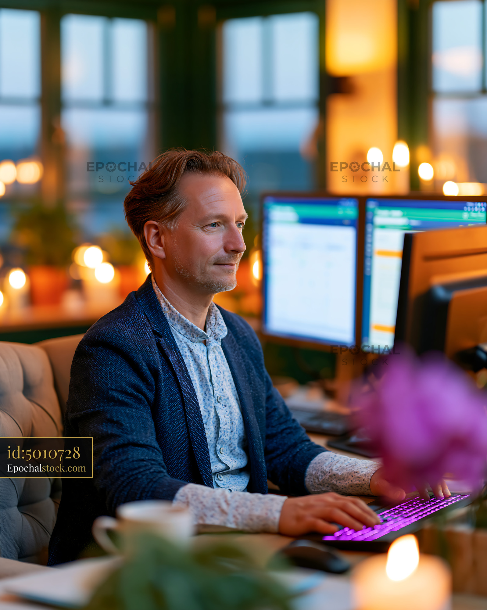 Citizen Using E-Government Portal at Home in Evening Light - stock photo