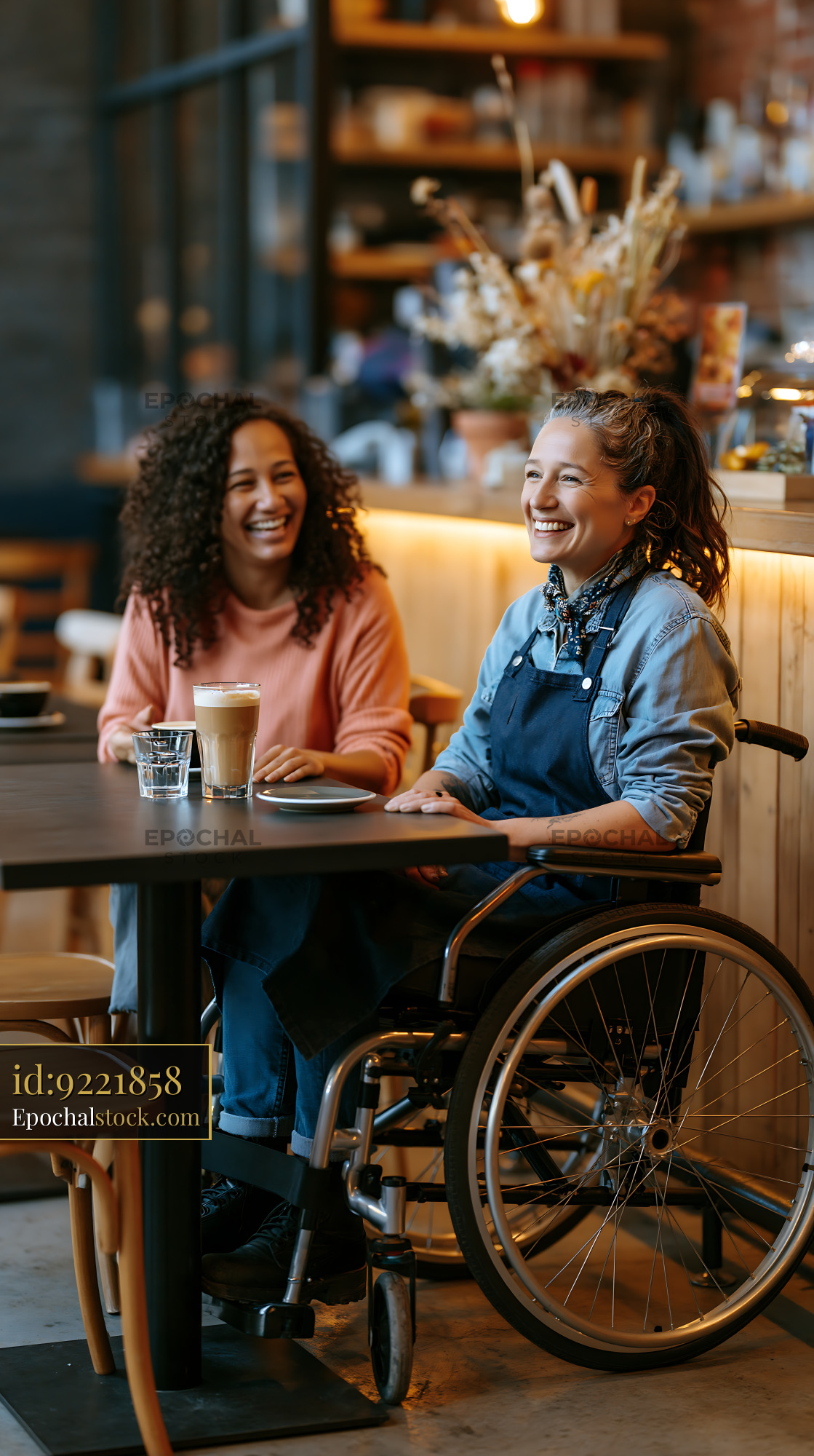 Watermarked full-resolution preview of Women enjoying coffee and conversation in a cafe