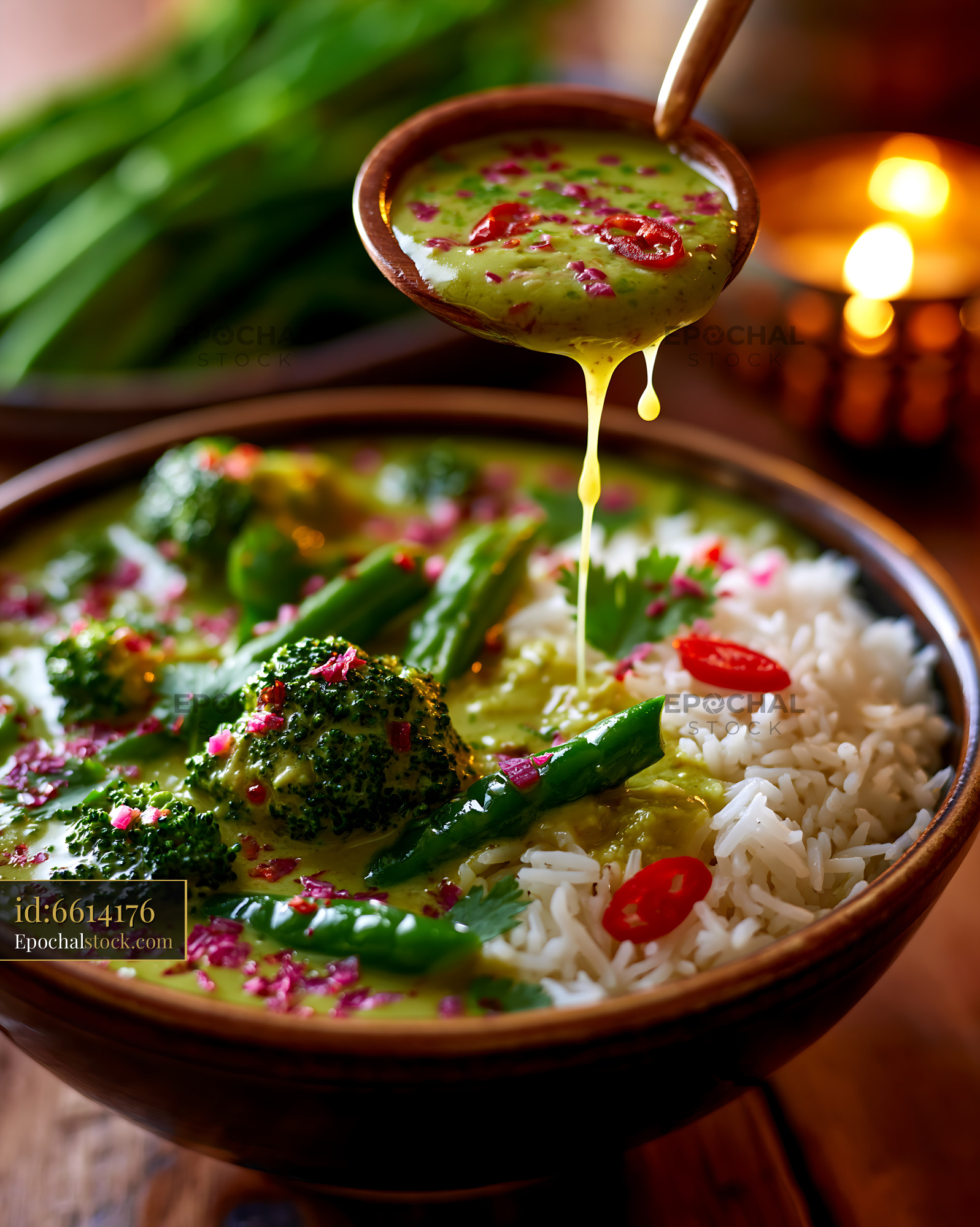 Watermarked full-resolution preview of Green vegetable curry served over white rice in a bowl