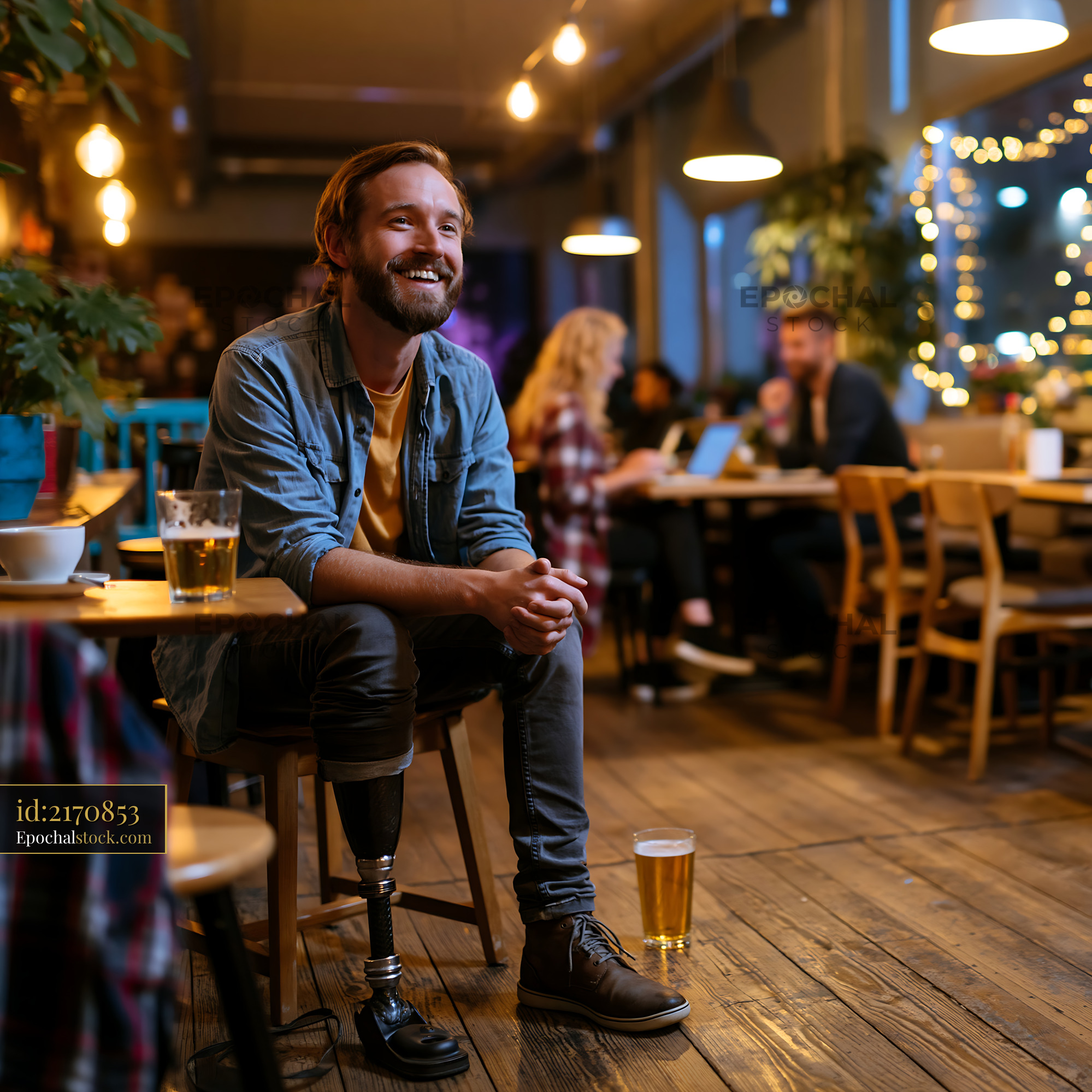 Watermarked full-resolution preview of Man with prosthetic leg sitting in a cafe enjoying drinks with friends
