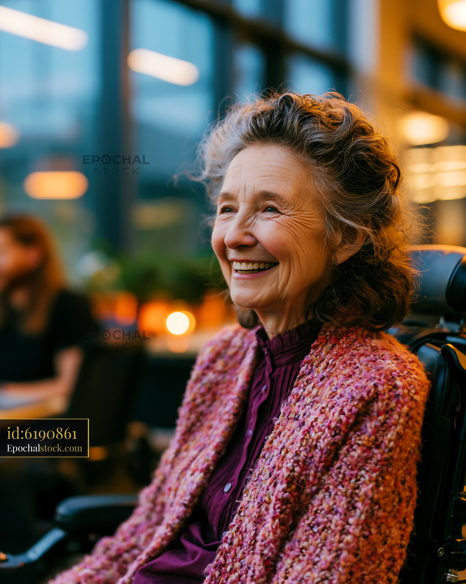Watermarked full-resolution preview of Smiling elderly woman in wheelchair at indoor cafe