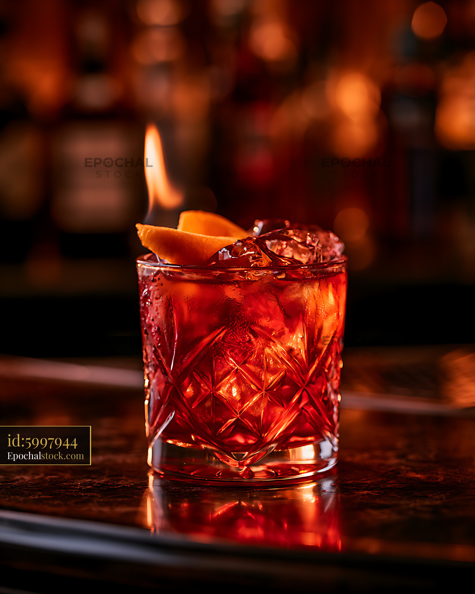 Watermarked full-resolution preview of Red cocktail with citrus garnish on a bar