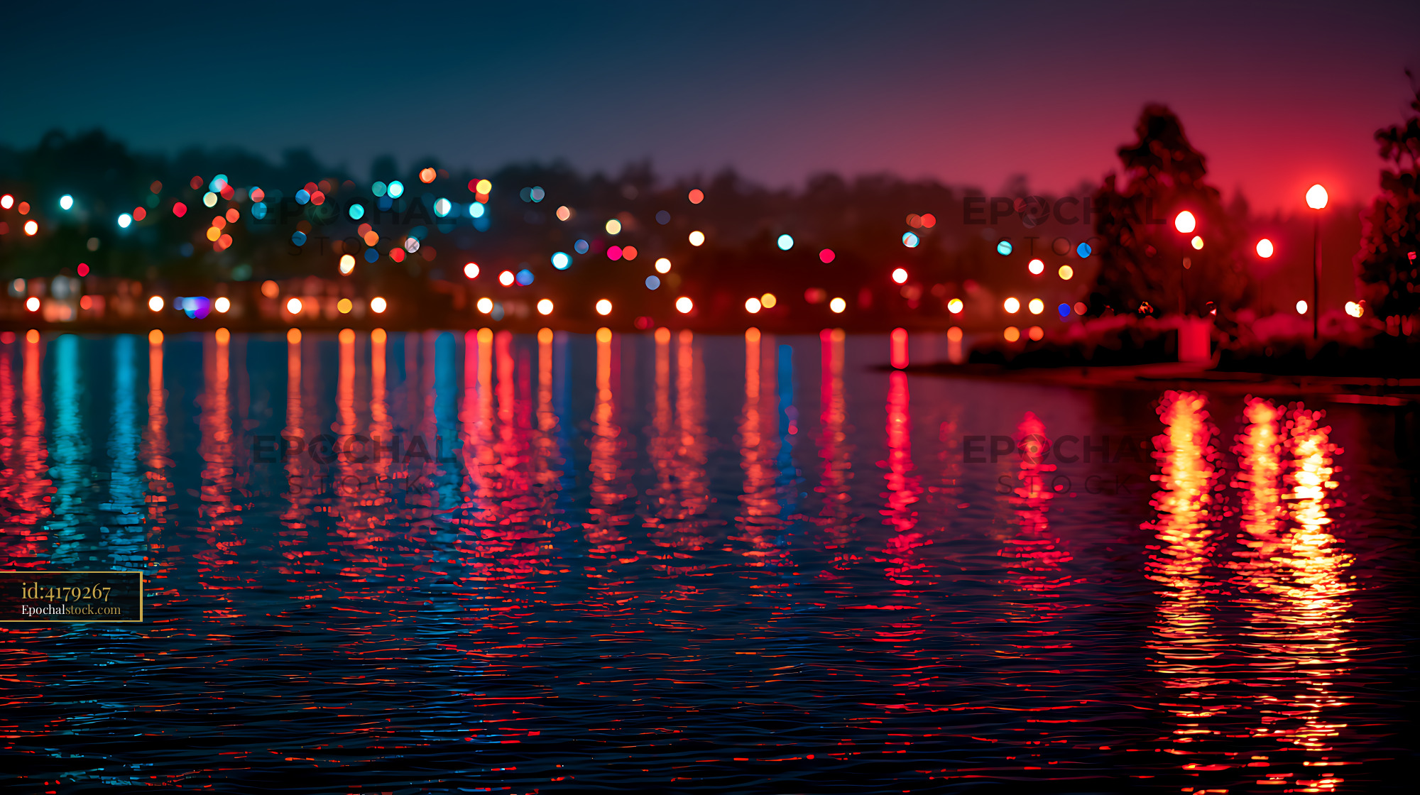Watermarked full-resolution preview of Vibrant bokeh lights over a lake at twilight