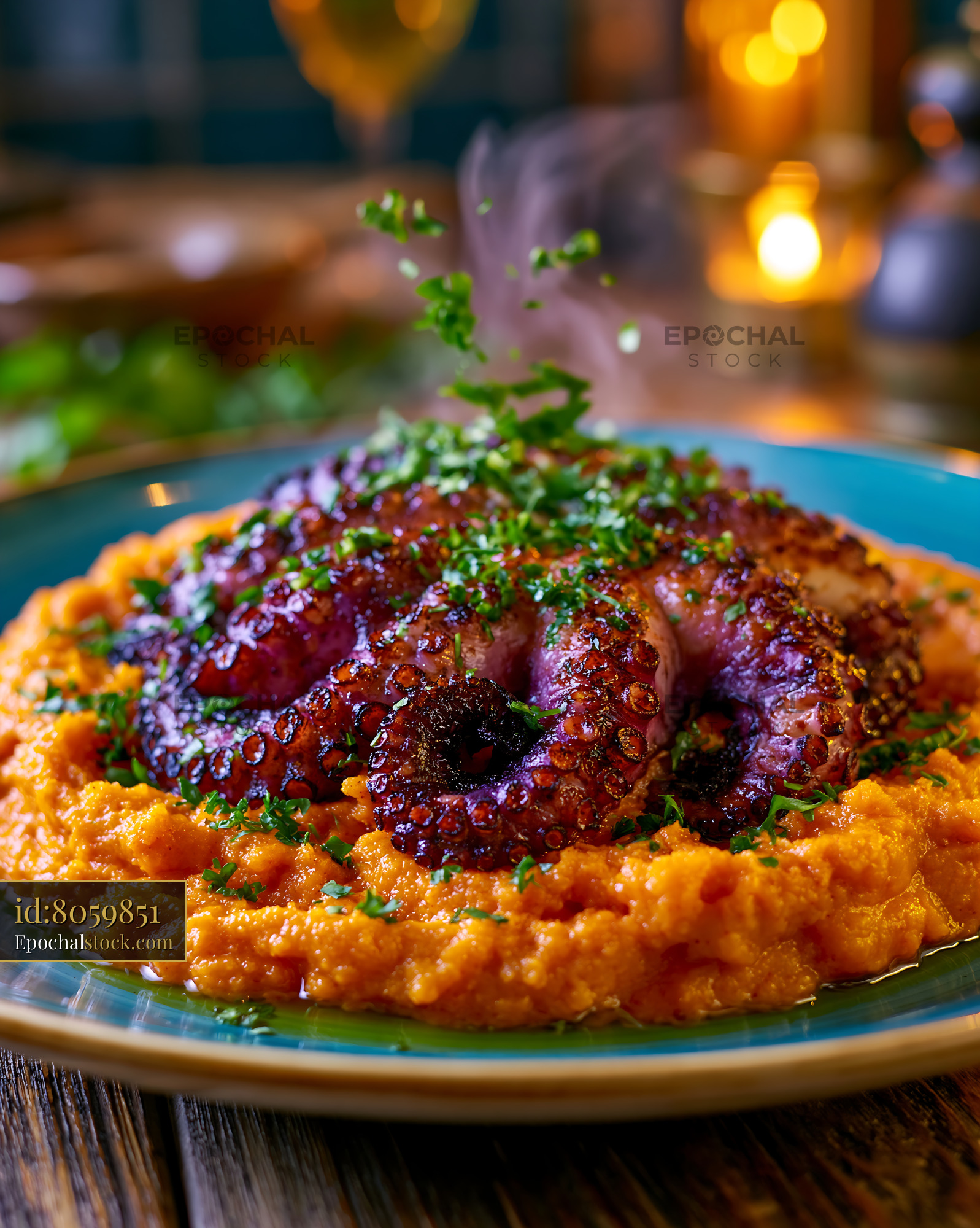 Watermarked full-resolution preview of Octopus served on a bed of creamy mash at a restaurant in the evening