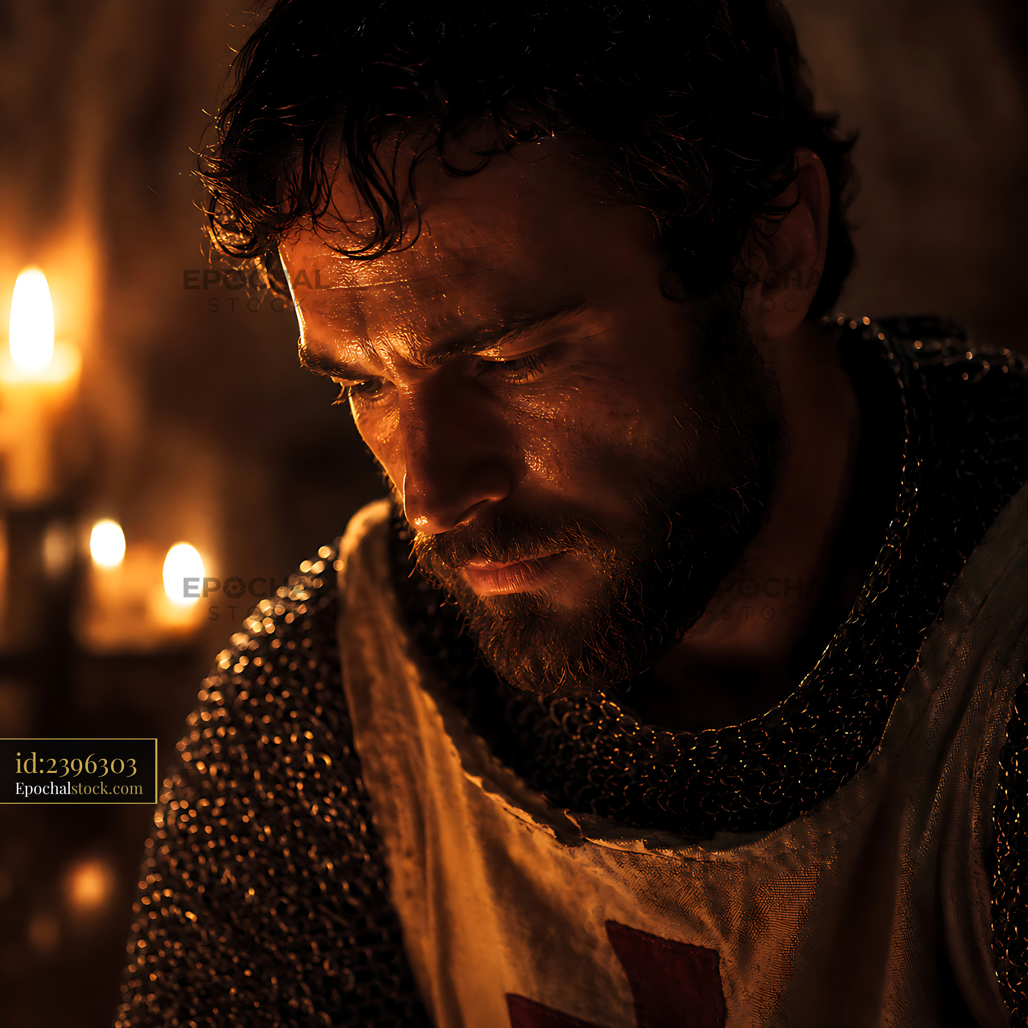 Knight Reflects in Candlelight, Deep in Thought - stock photo