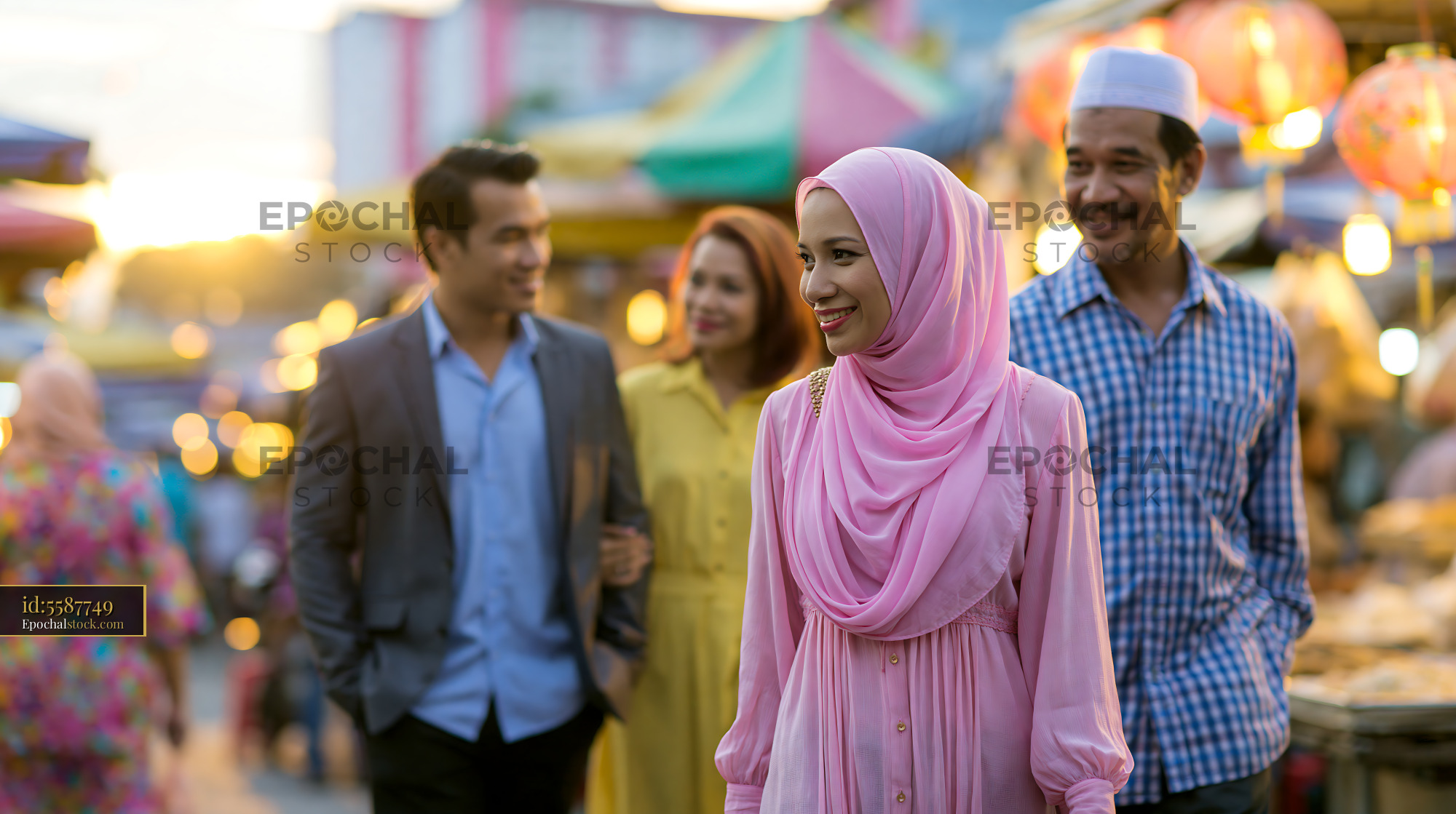 Watermarked full-resolution preview of People walking through a vibrant market during sunset
