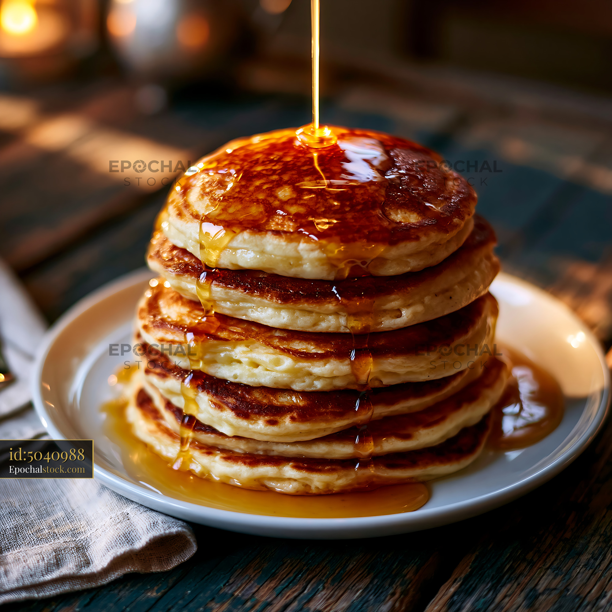 Watermarked full-resolution preview of Pancake stack with flowing maple syrup