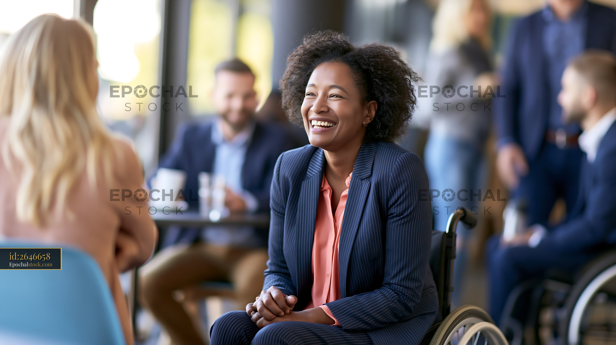 Watermarked full-resolution preview of Group of people chatting at a meeting in a modern office space