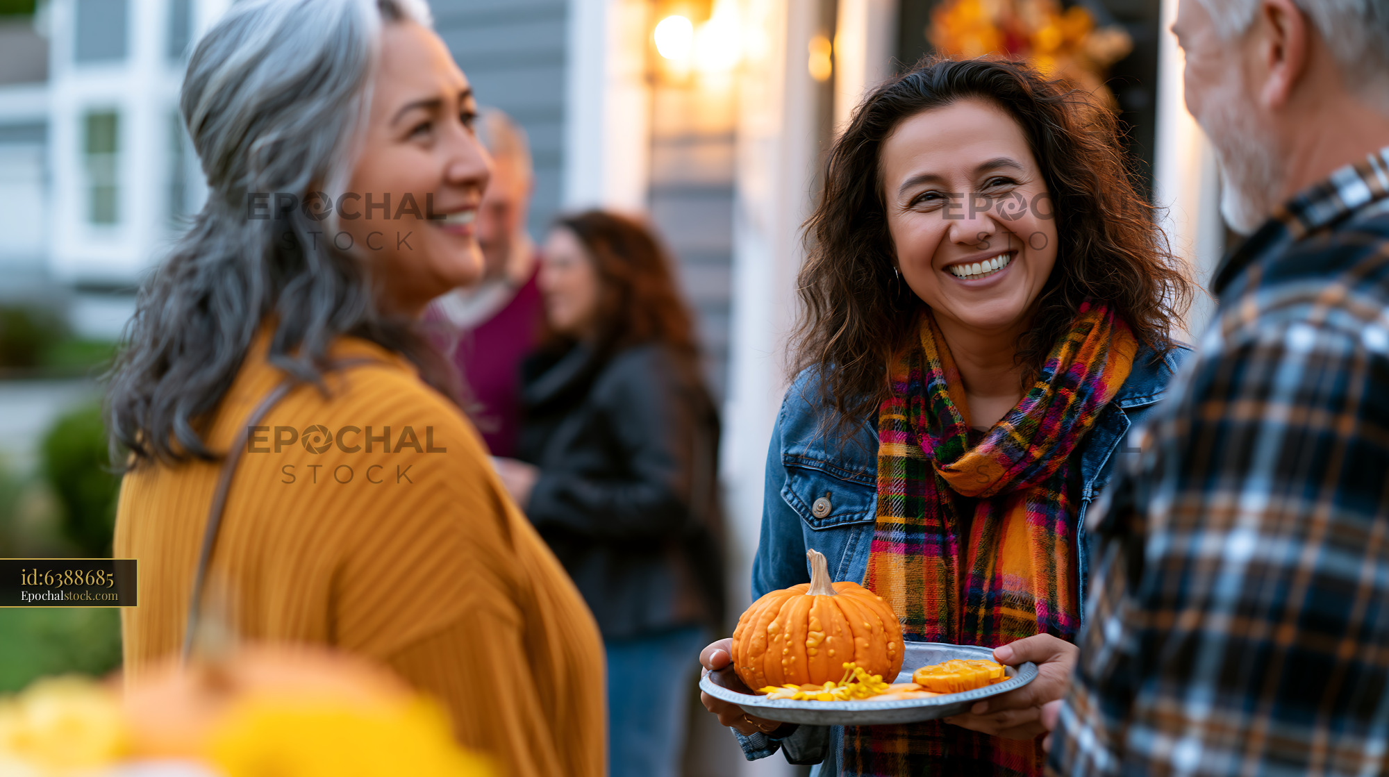 Watermarked full-resolution preview of Gathering with friends during a fall celebration