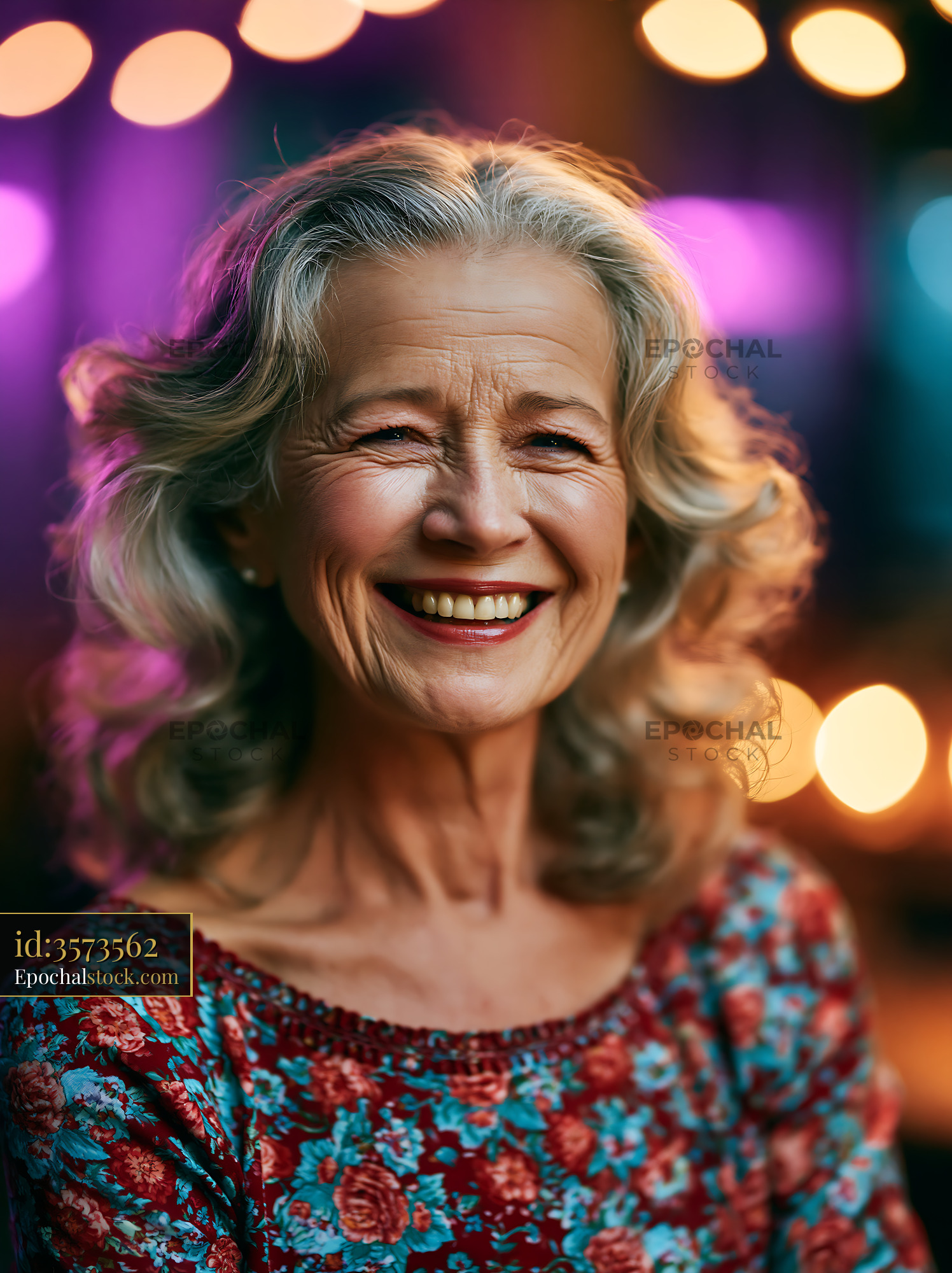 Smiling Woman With Curly Hair in Colorful Top at Evening Event - stock photo