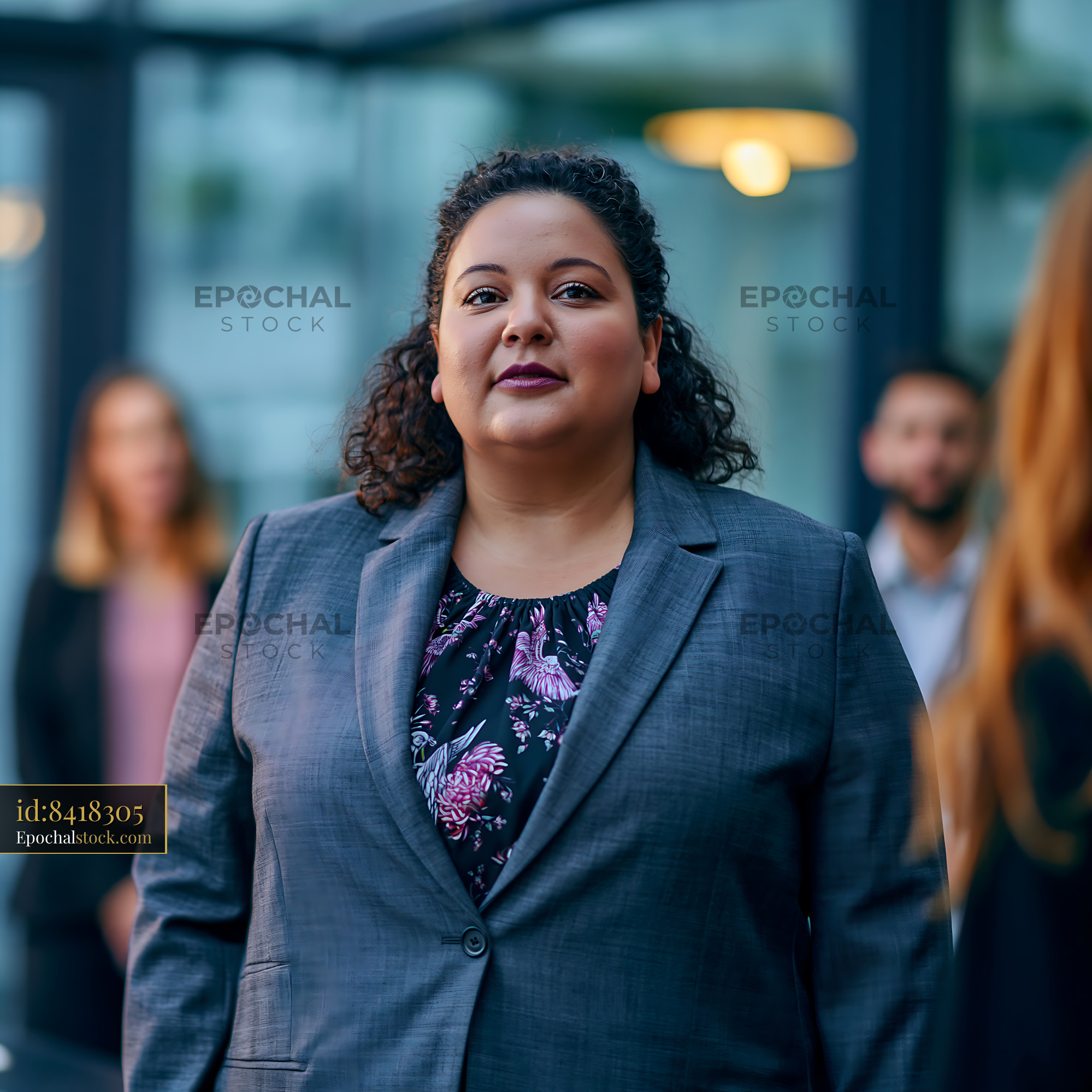 Watermarked full-resolution preview of Business meeting in modern office setting with professionals