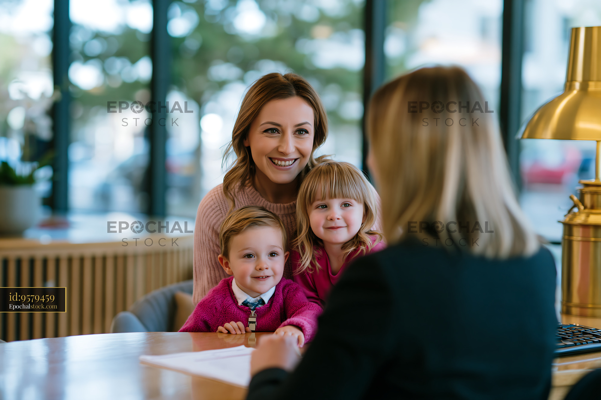 Watermarked full-resolution preview of Mother and two children having a conversation with a professional