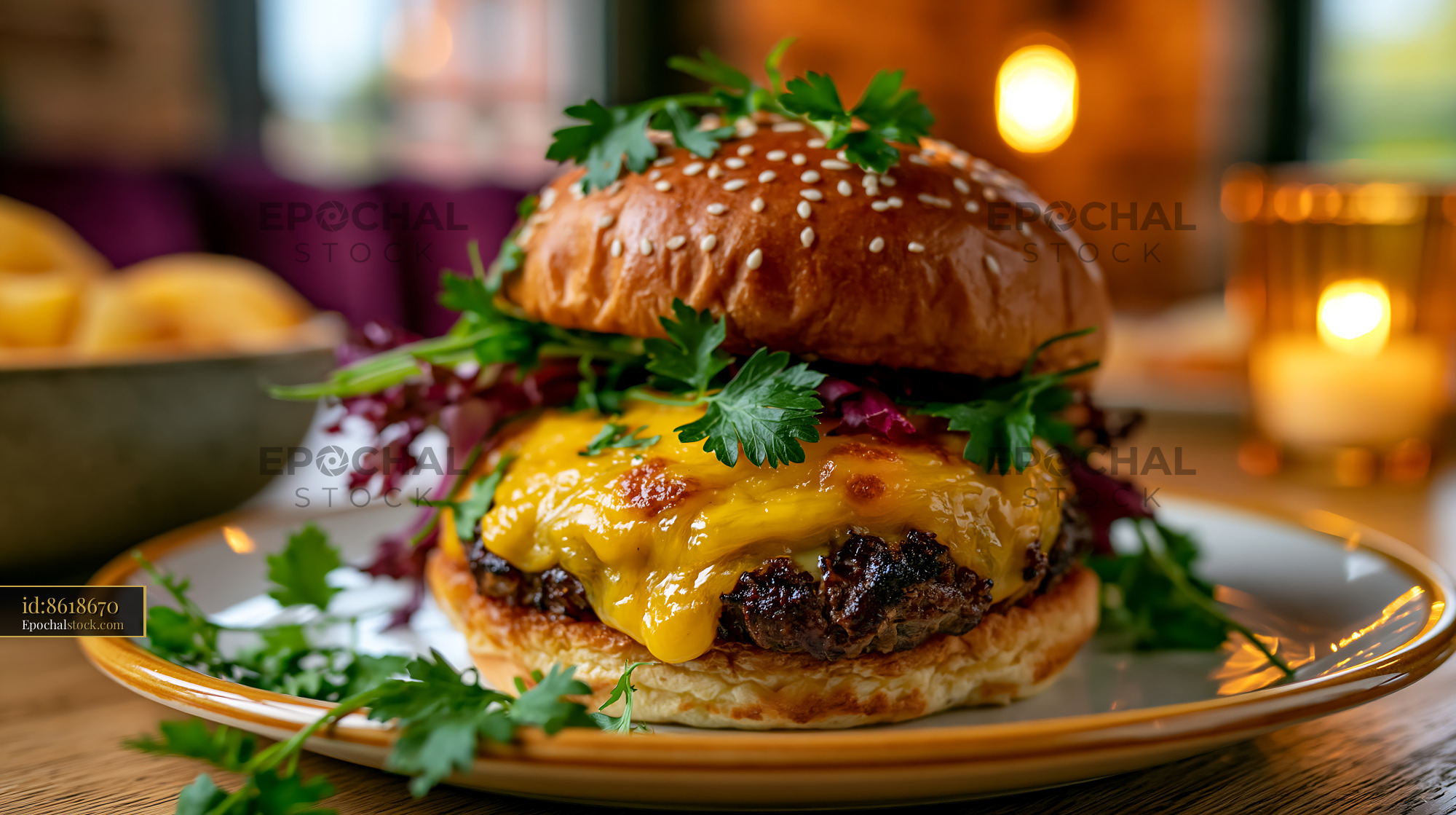 Watermarked full-resolution preview of Juicy burger with melted cheese served on a plate