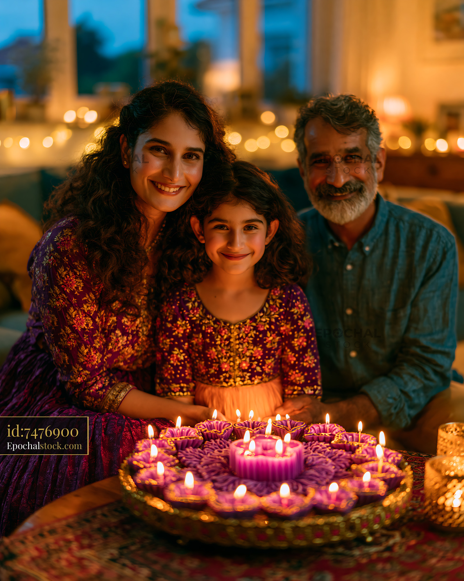 Watermarked full-resolution preview of Family celebration with candles and sweets in a cozy home