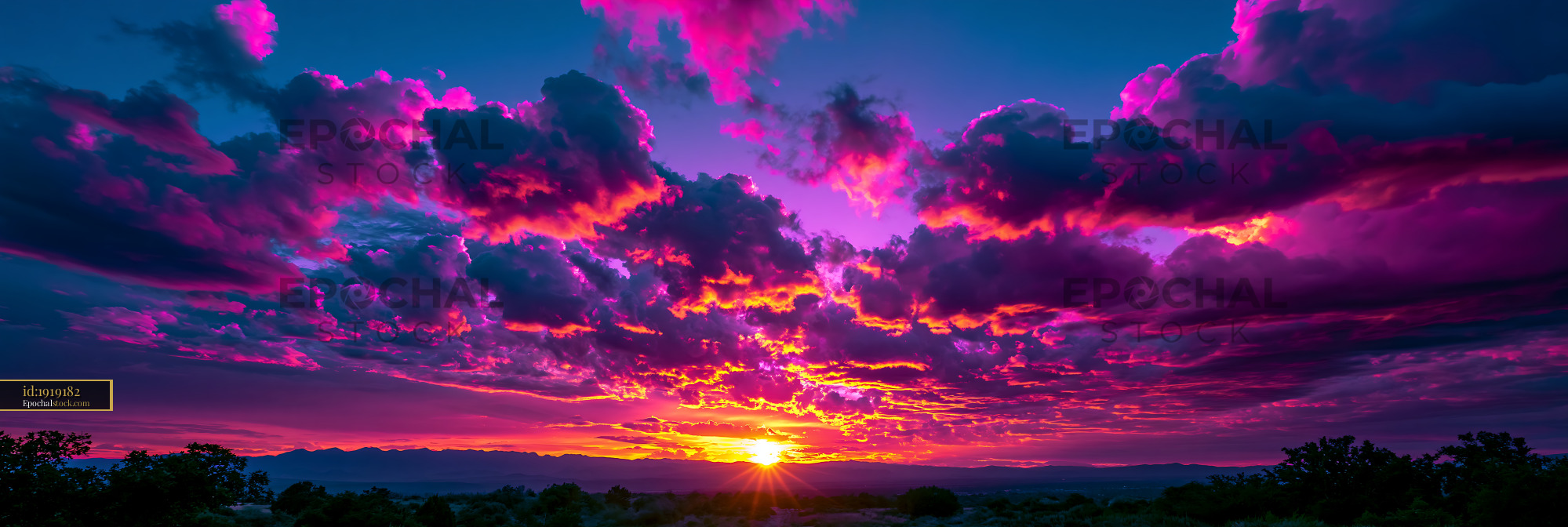 Watermarked full-resolution preview of Colorful mountain sunset with dramatic cloud formations