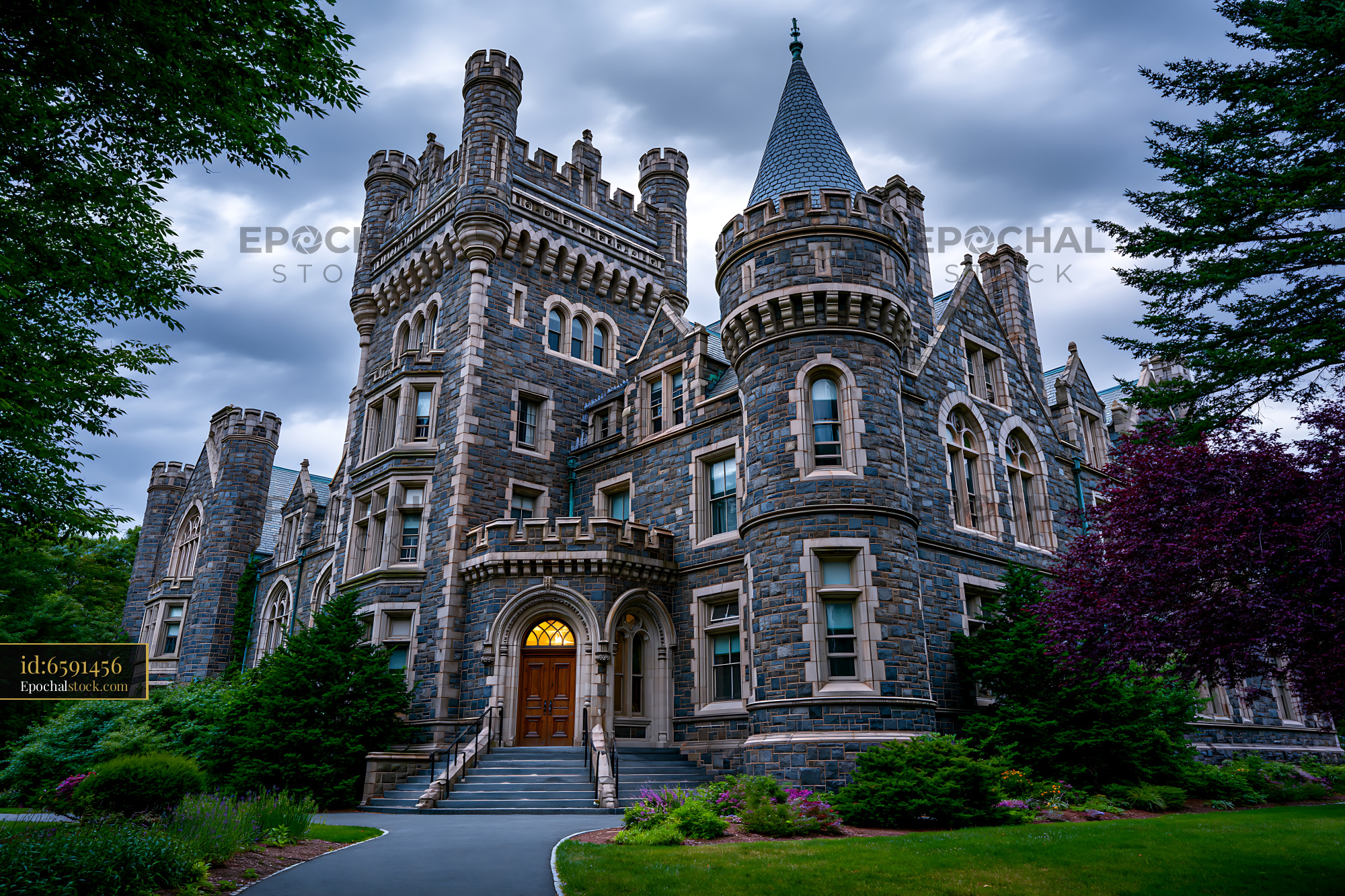 Watermarked full-resolution preview of Stone castle with towers and green landscape in cloudy sky