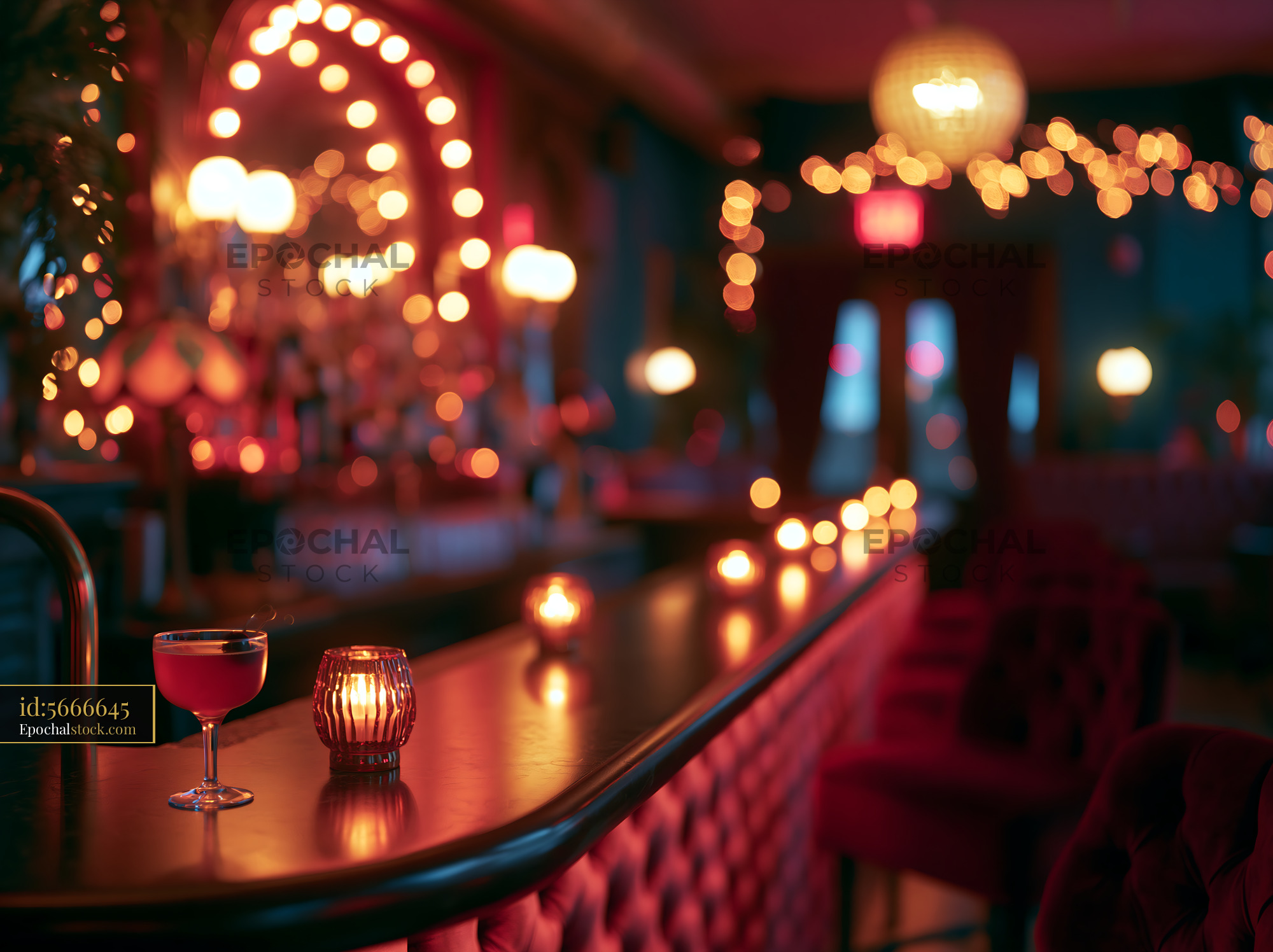 Cocktail Sits on Bar Counter as Lights Glow in Bar Setting - stock photo