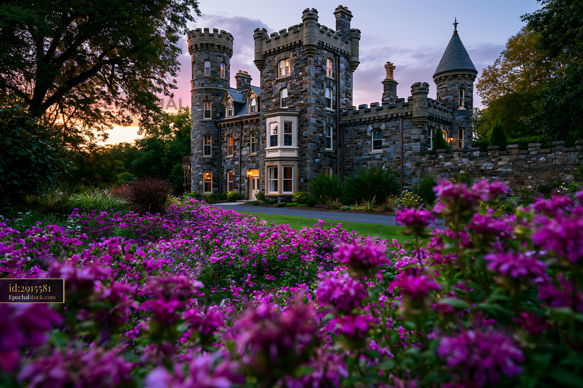 Watermarked full-resolution preview of Castle surrounded by flowers at sunset in a garden setting