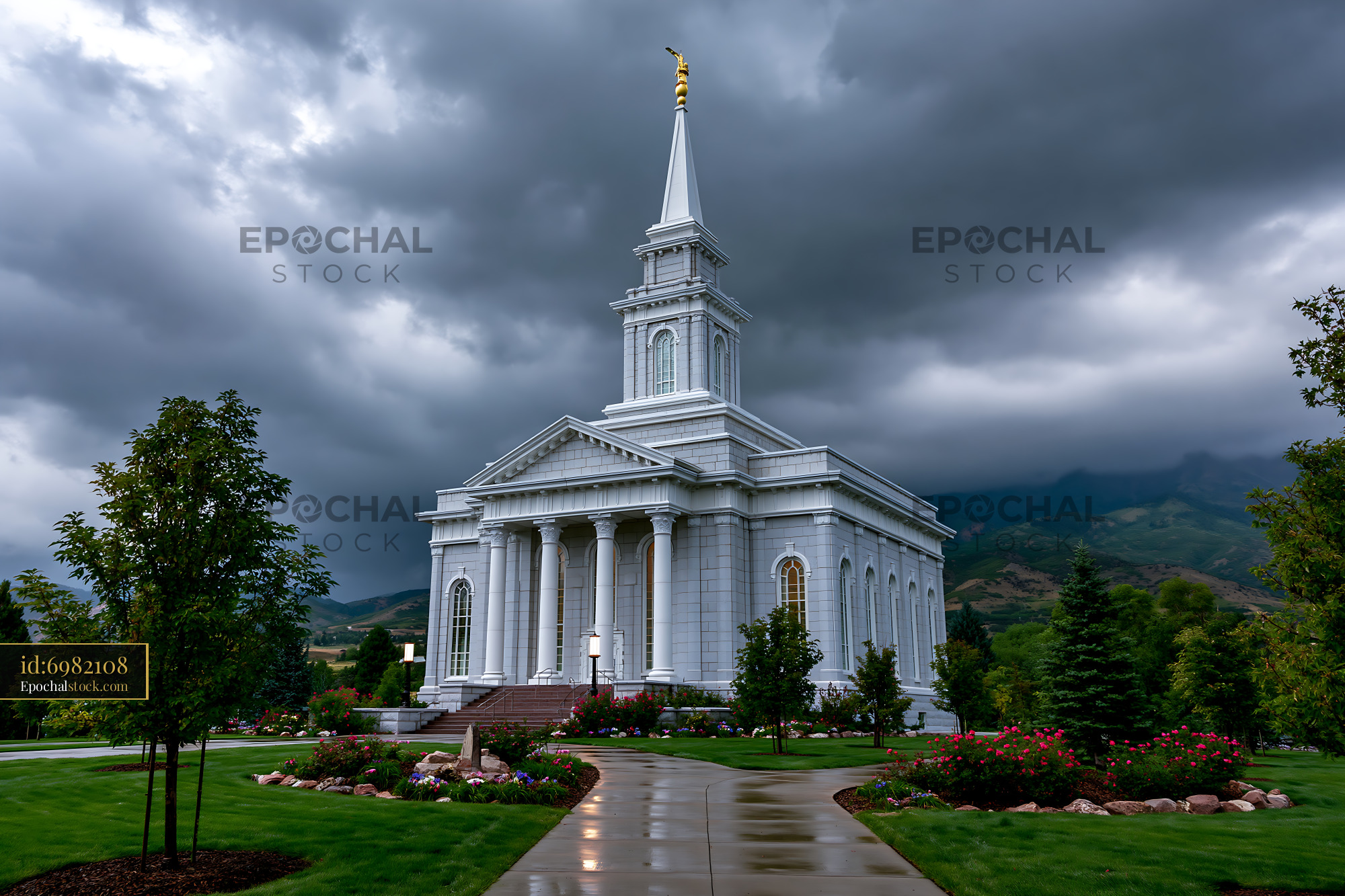 Watermarked full-resolution preview of Cloudy day at a large white church building with a tall spire