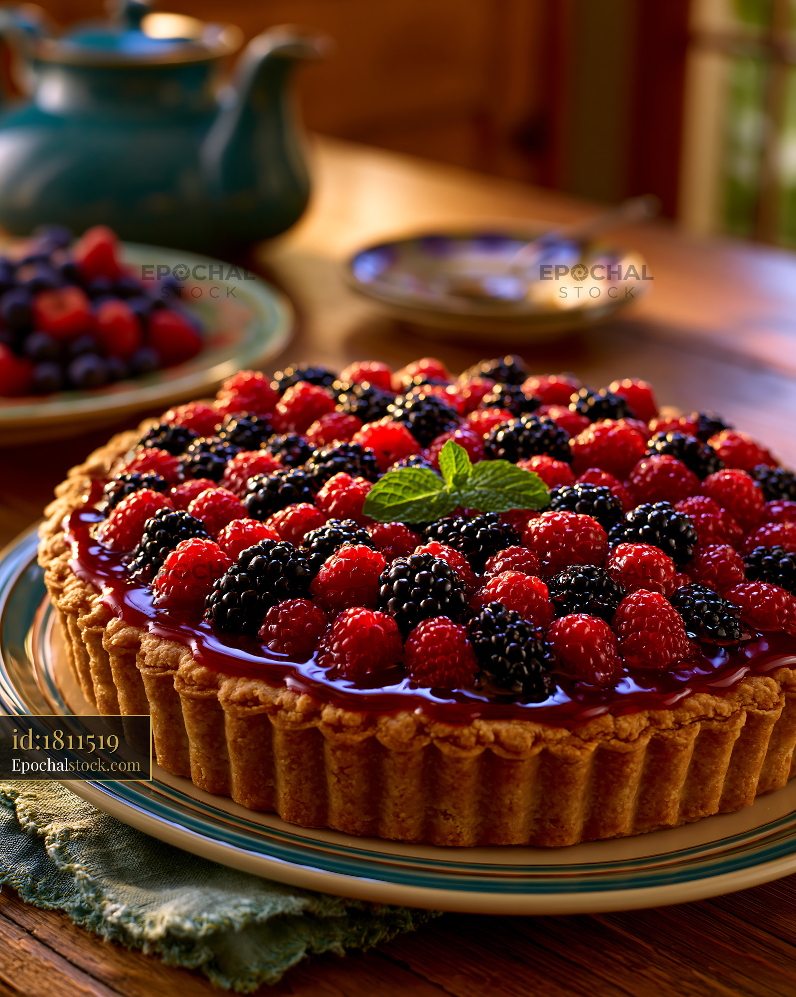 Watermarked full-resolution preview of Berry tart on a wooden table with tea and berries in the background