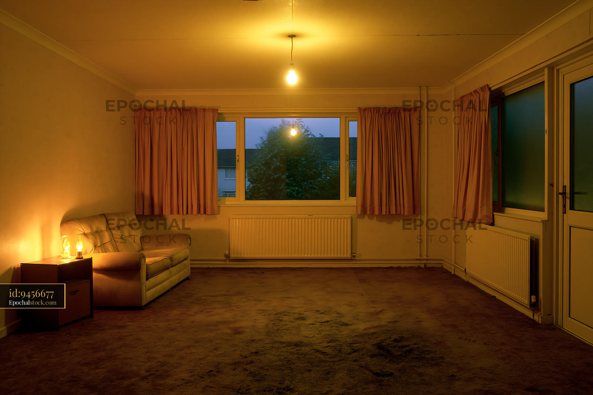 Watermarked full-resolution preview of Living room with warm light at dusk