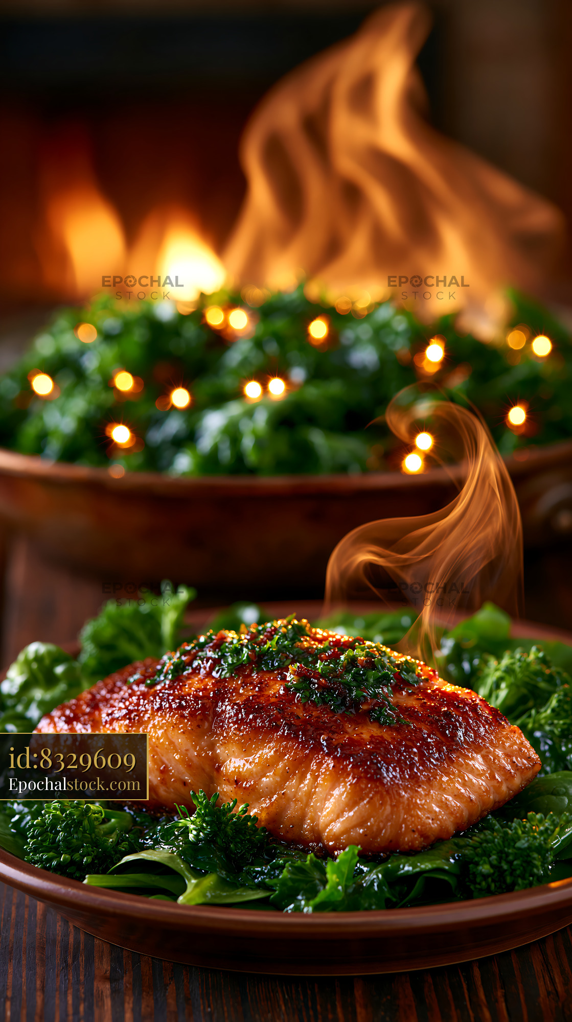 Watermarked full-resolution preview of Salmon fillet served on greens with warm lights in the background