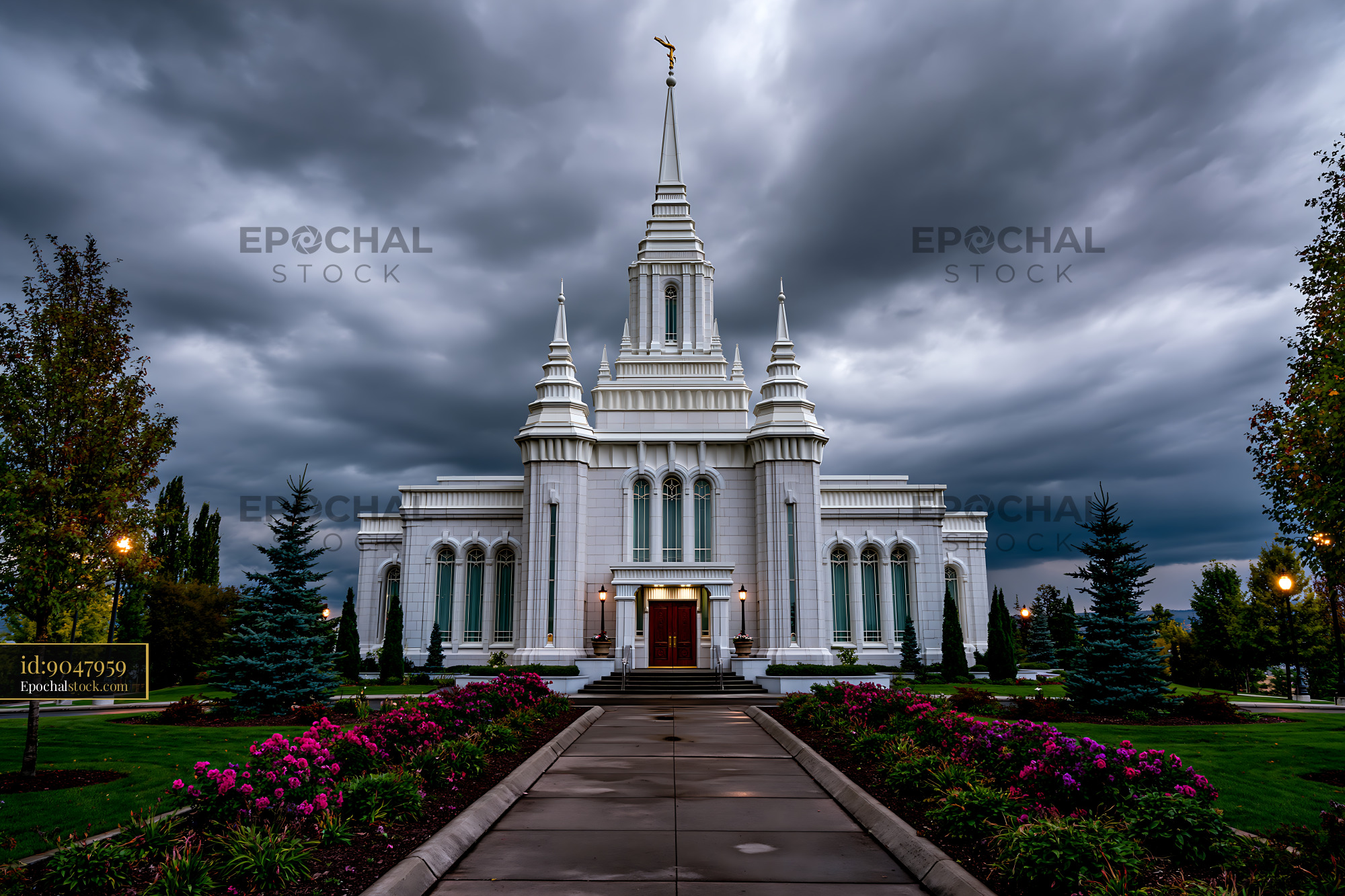 Watermarked full-resolution preview of Large white building with a tall spire under a cloudy sky