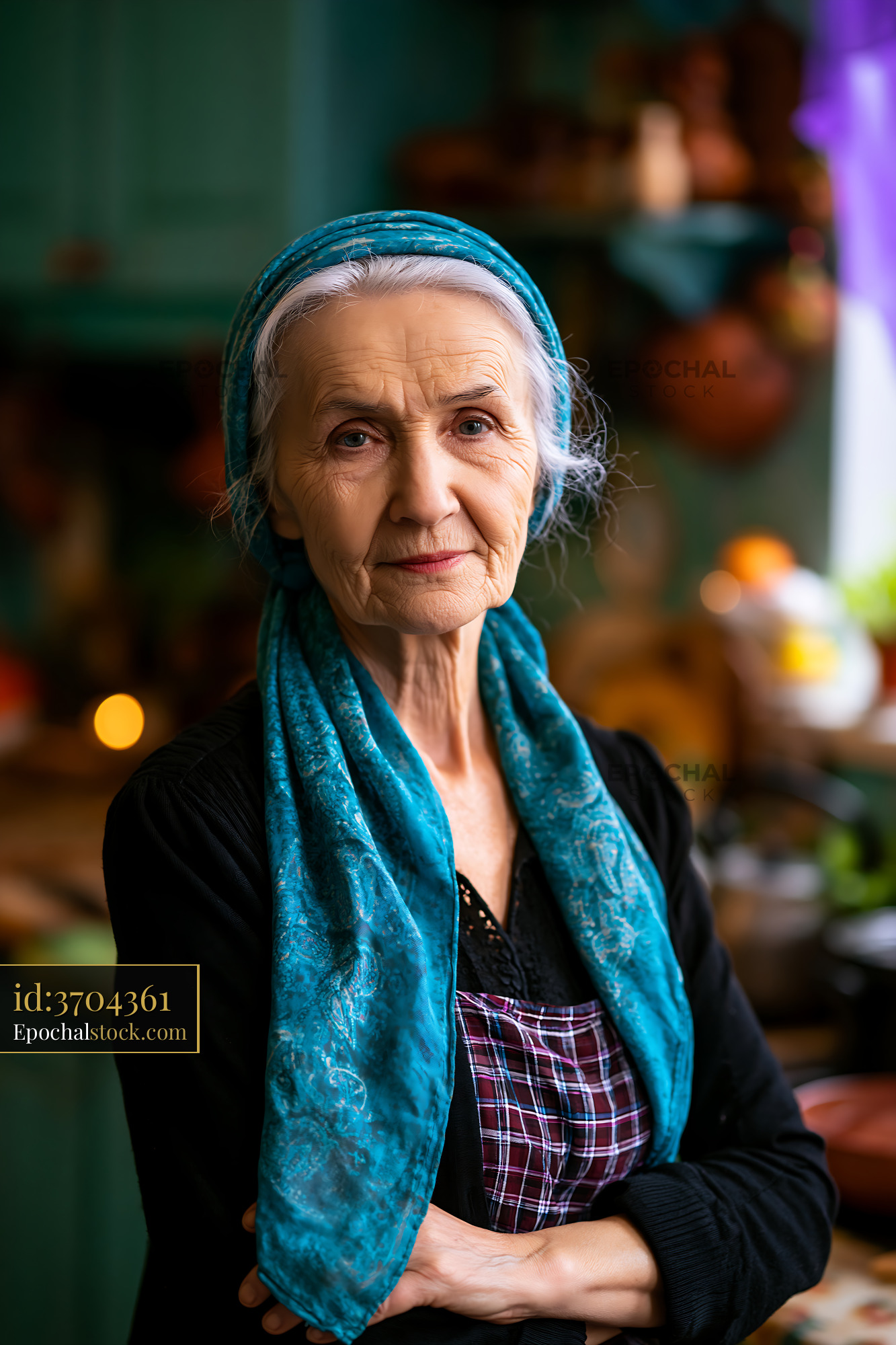 Watermarked full-resolution preview of Elderly woman in blue scarf stands in cozy kitchen